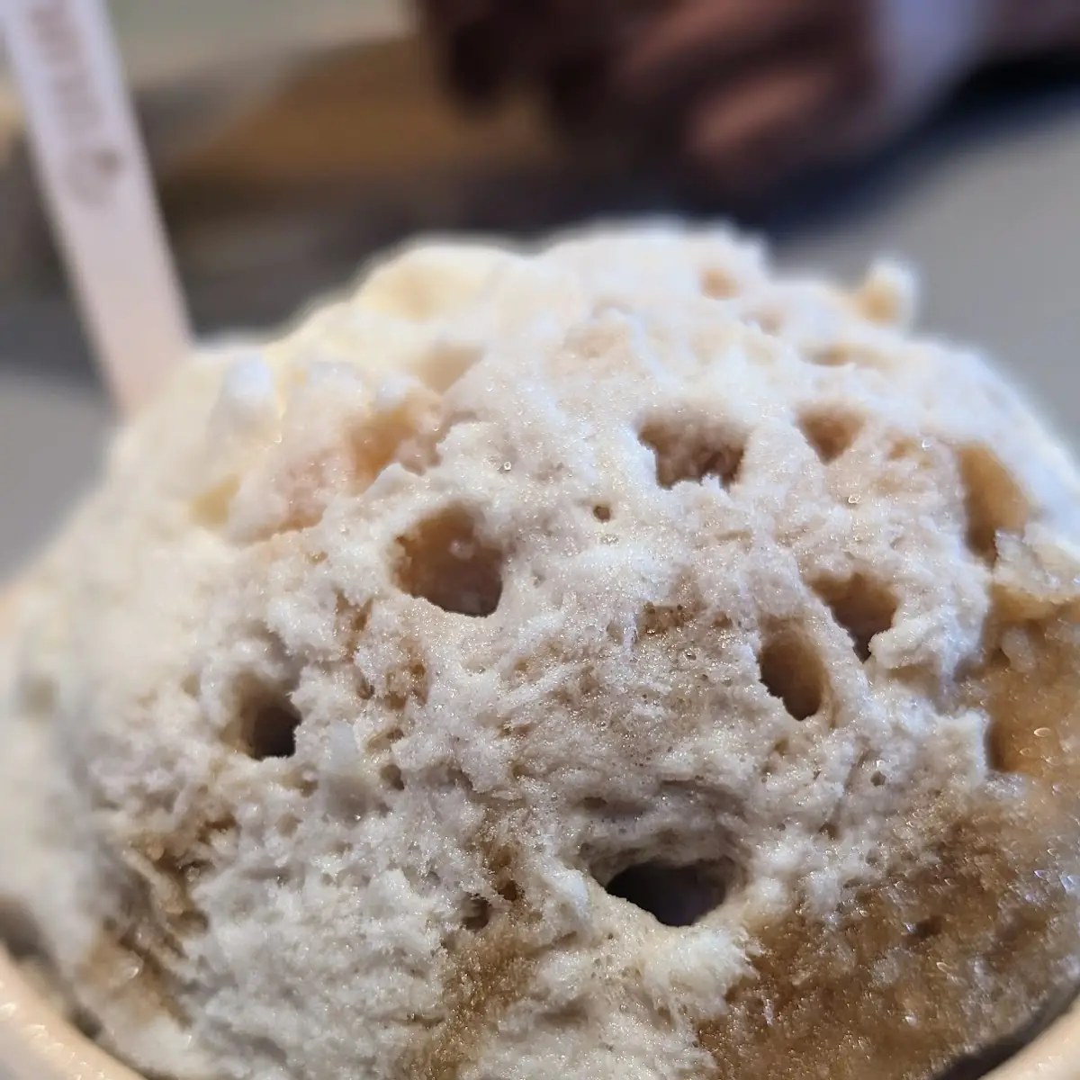 Half Coconut Half Coffee over Macadamia Nut Ice Cream with Snow Cap
