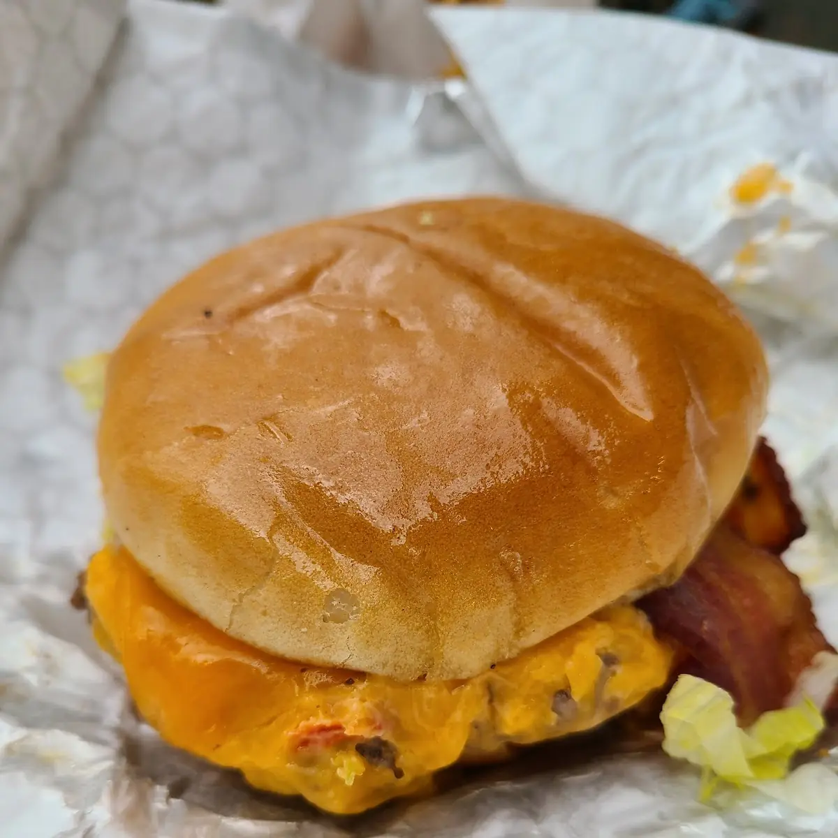 Burger with Cheddar Cheese Pimento Cheese Bacon and BBQ Sauce