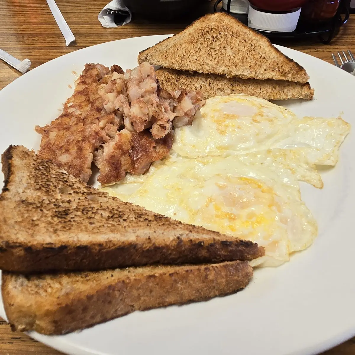 Eggs Corned Beef Hash and Wheat Toast