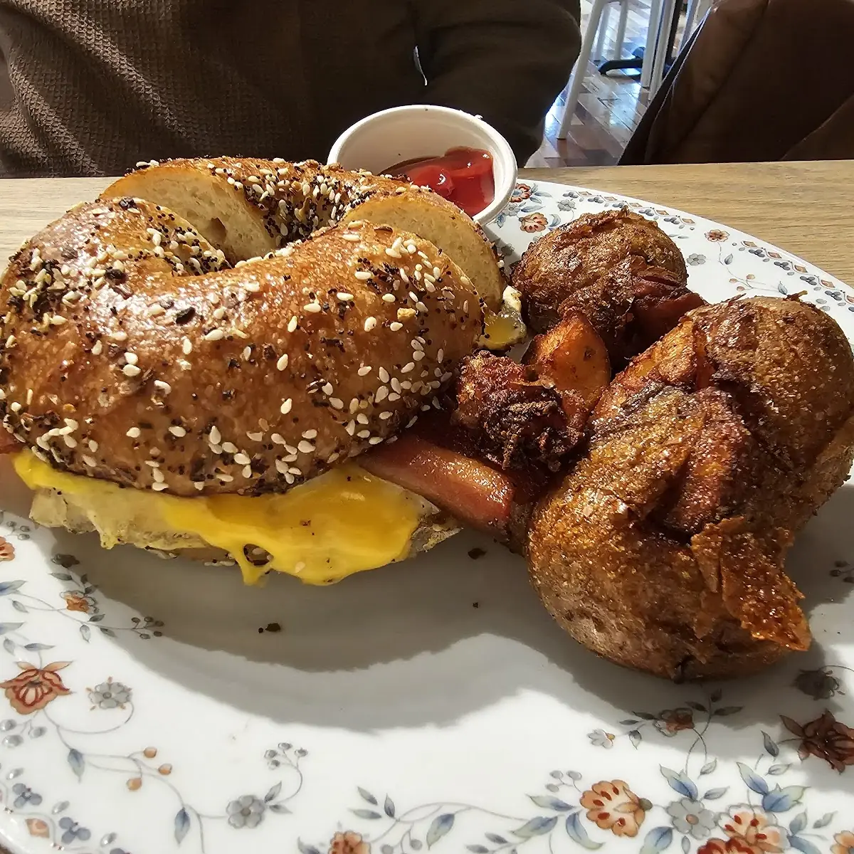 Breakfast Sandwich on Everything Bagel with Side of Smashed Potatoes