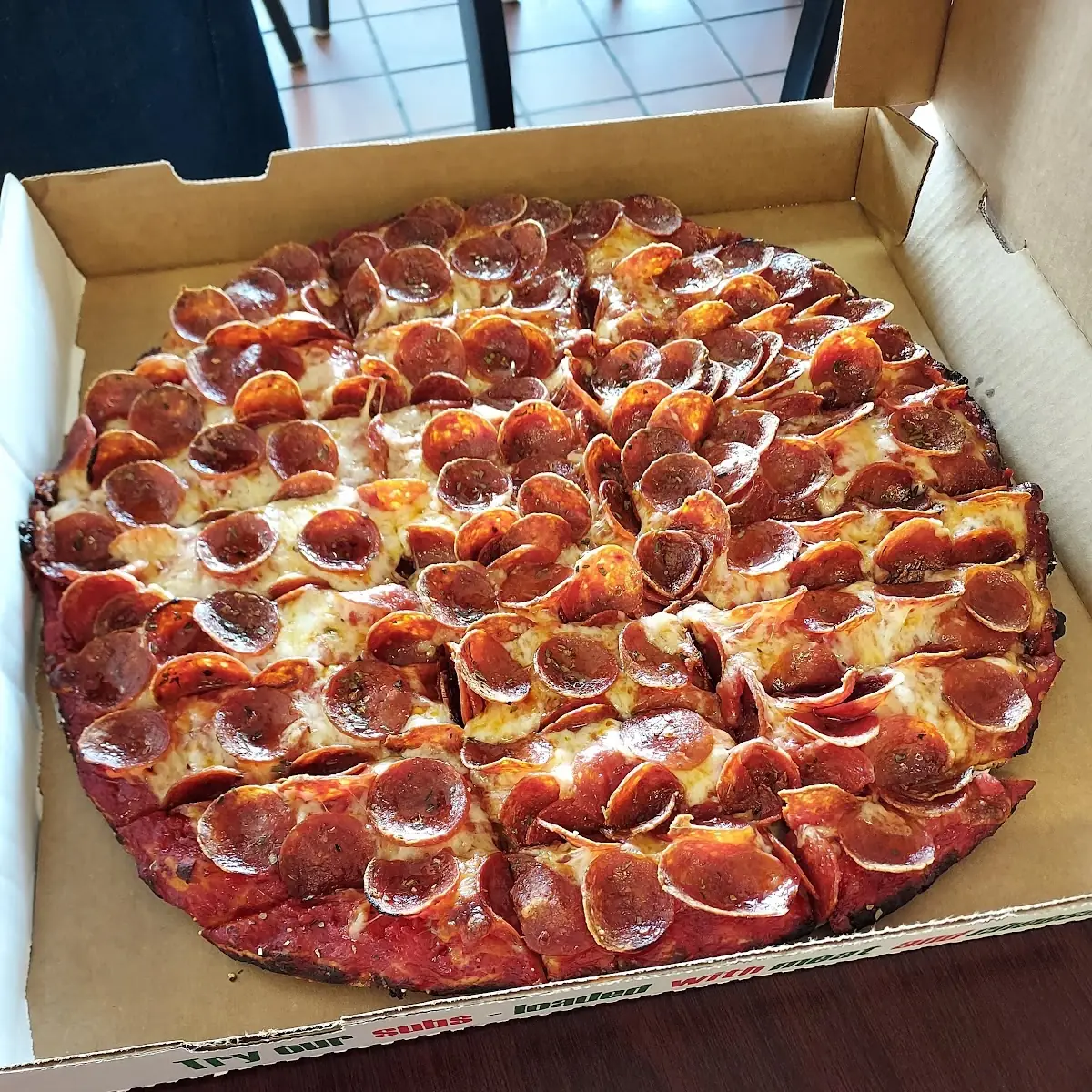 Famous Thin Crust One Topping