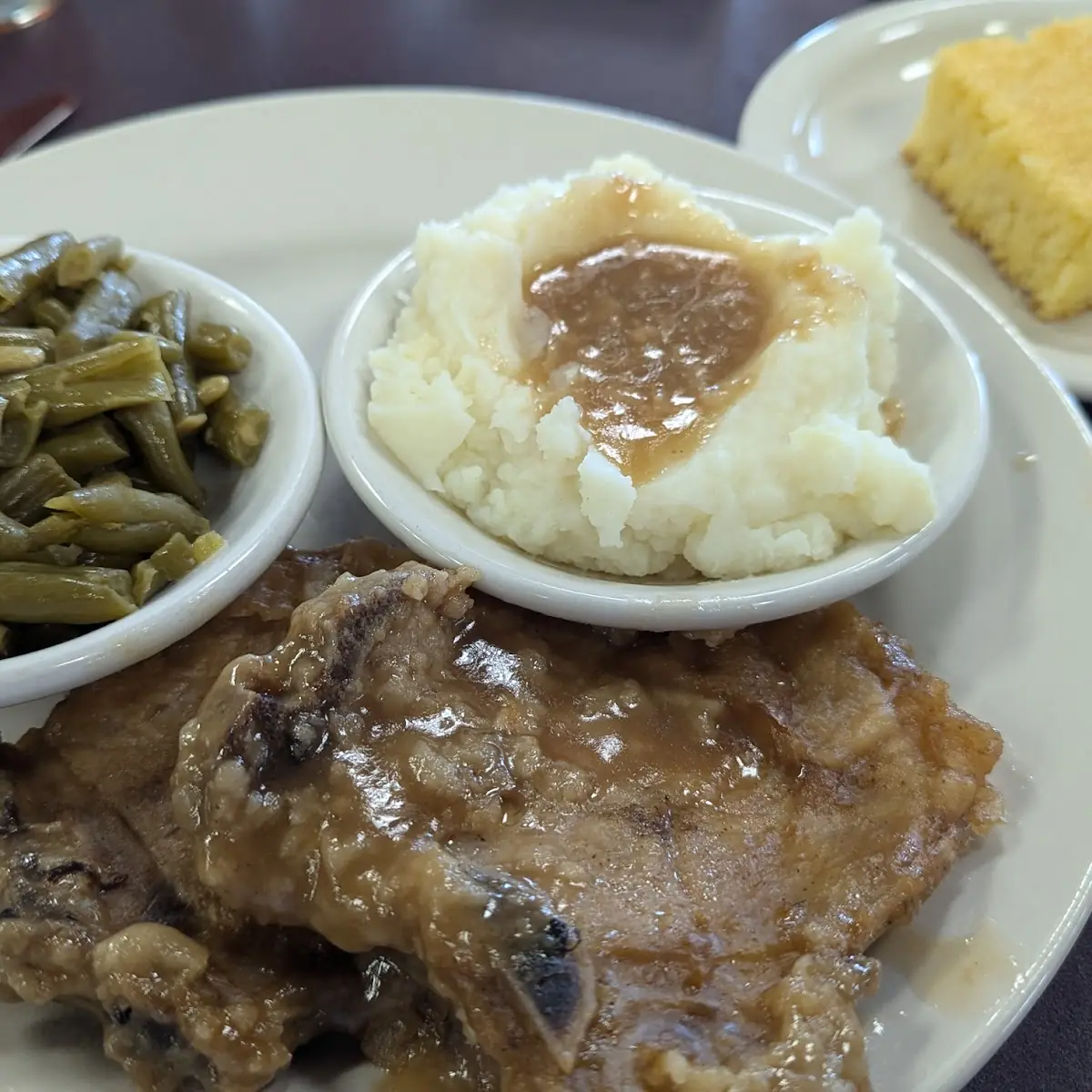 Smothered Pork Chops Mashed Potatoes and Green Beans