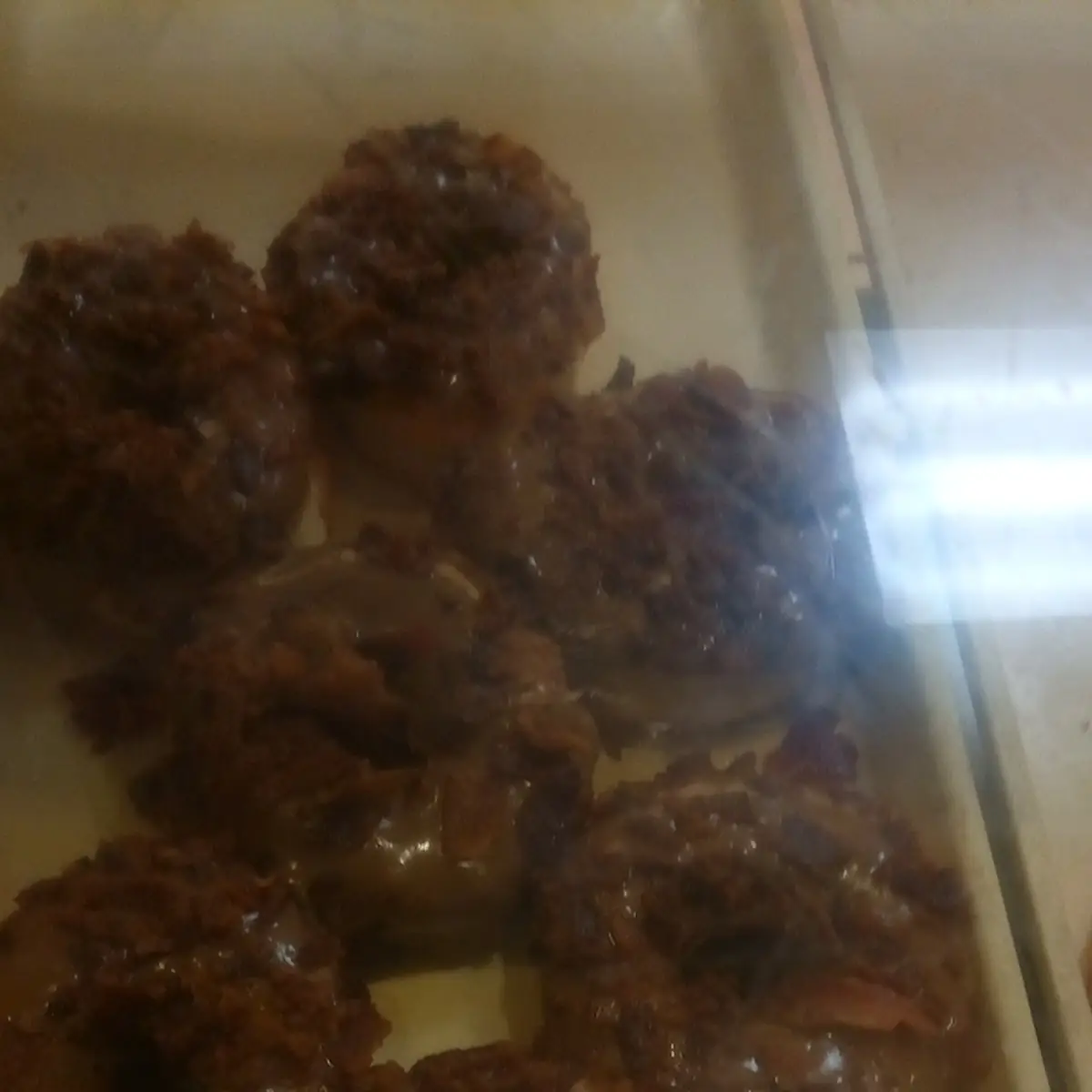 Glazed Donuts with Bacon Sprinkled on Them