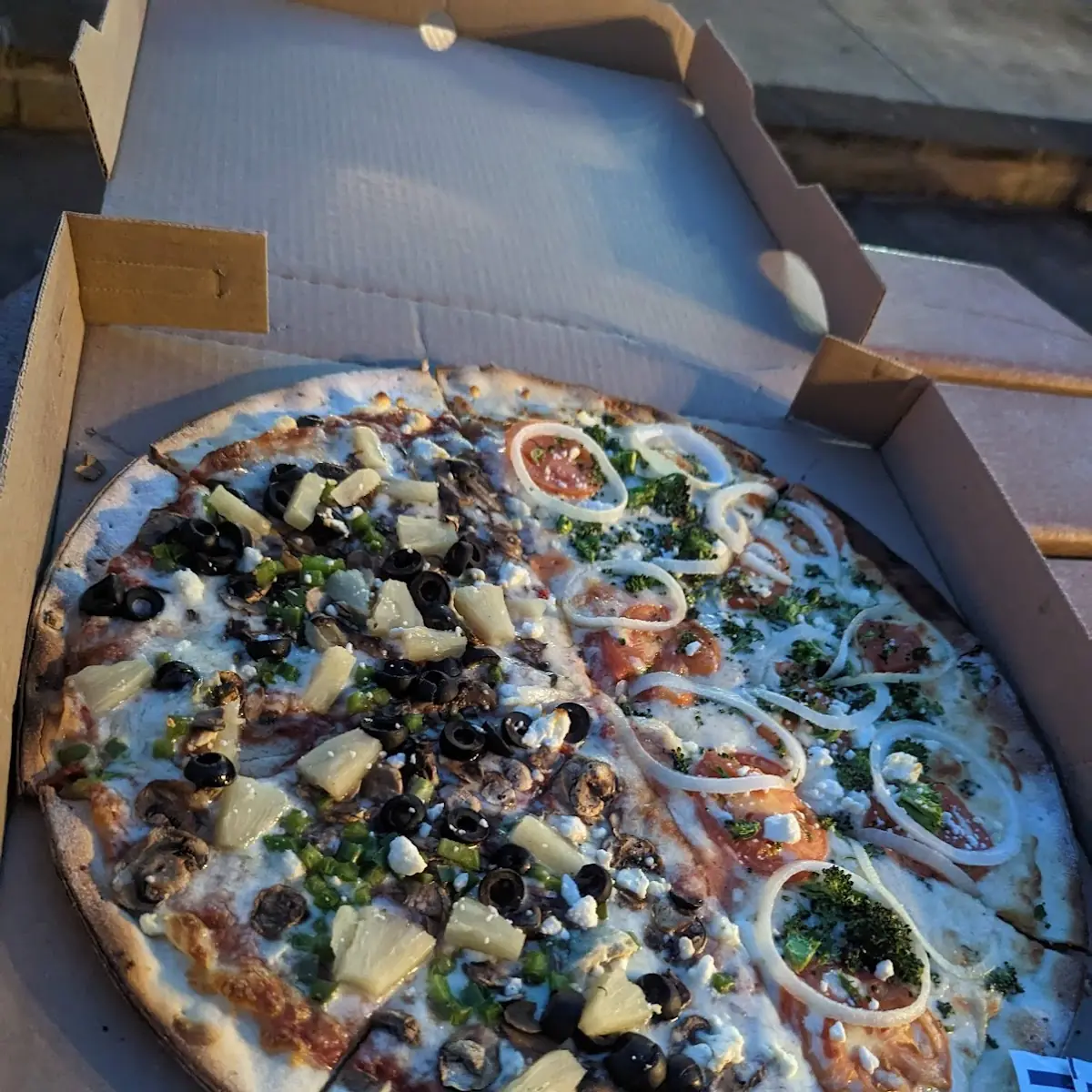 Half Veggie Pizza Half White Pizza