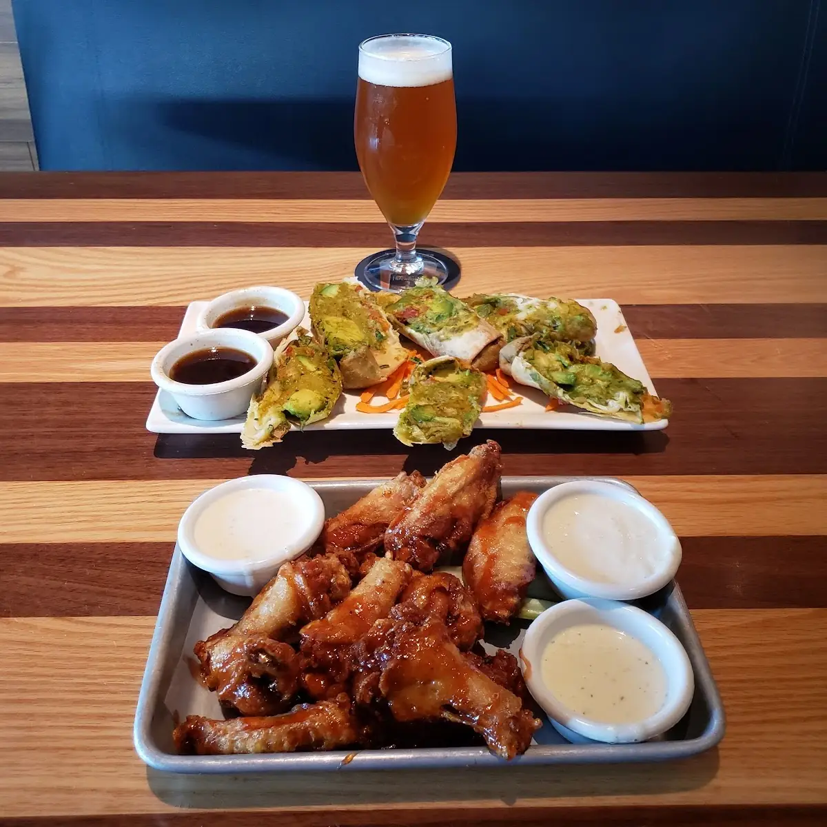 Avocado Egg Rolls Cherry Chipotle Chicken Wings and Committed Double IPA Beer