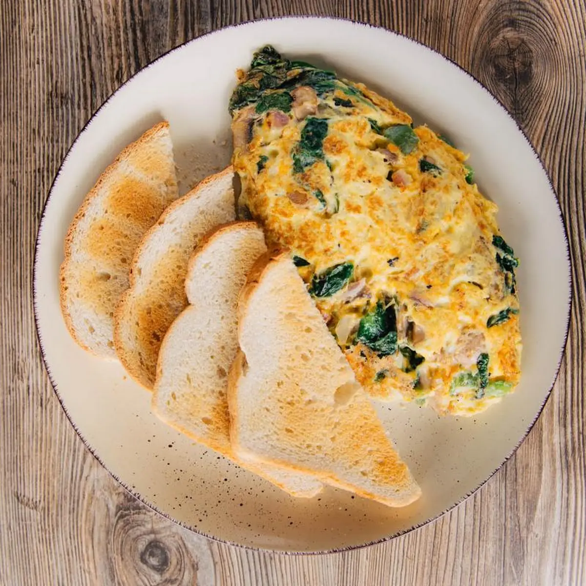 Bacon Cheddar and Spinach Omelet