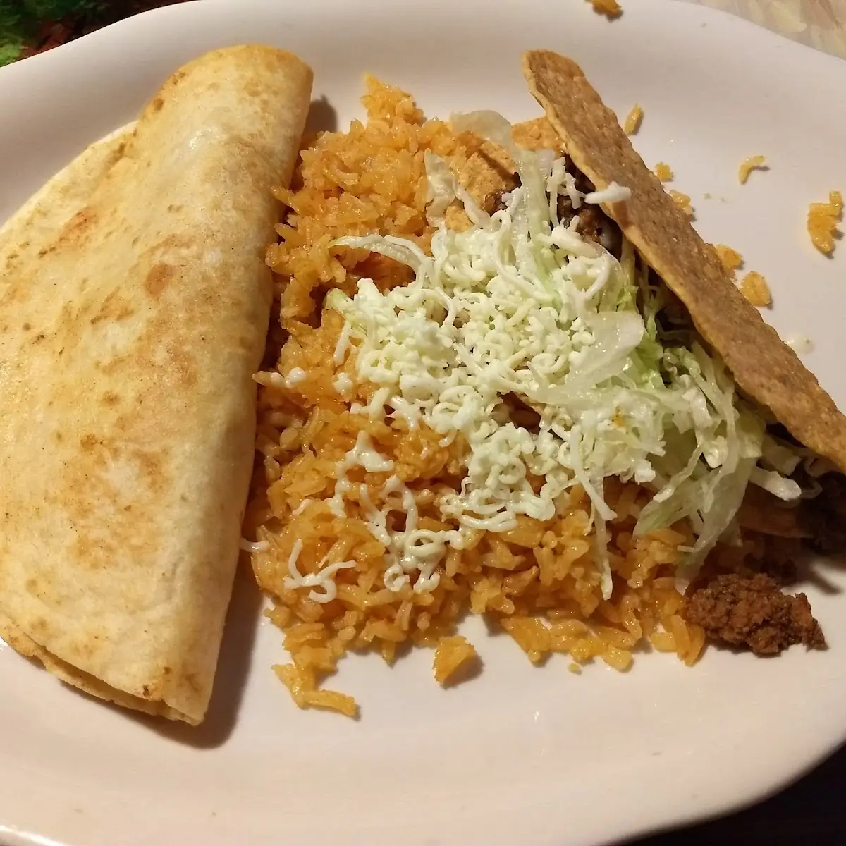 One Beef Taco Spanish Rice and Fried Beans