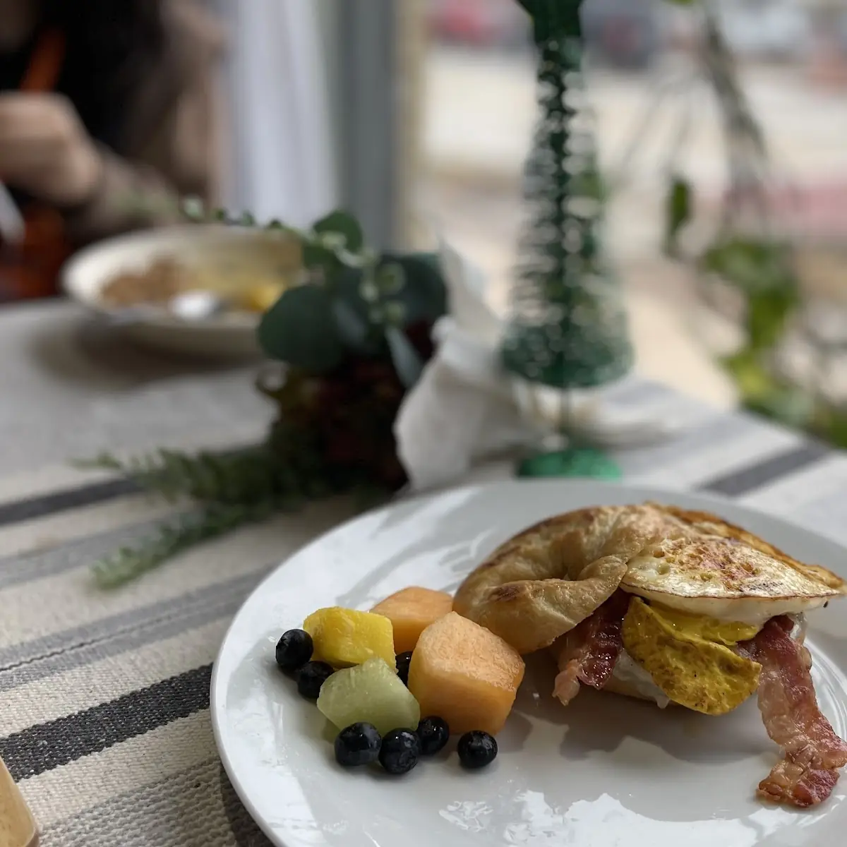 Egg Bacon and Sausage Bagel Sandwich