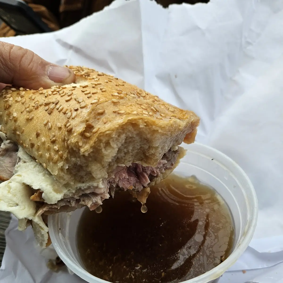 Roast Beef Sandwich Dunked in Gravy