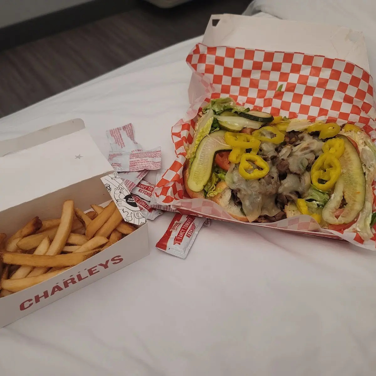 Philly Cheesesteak Sandwich and Fries