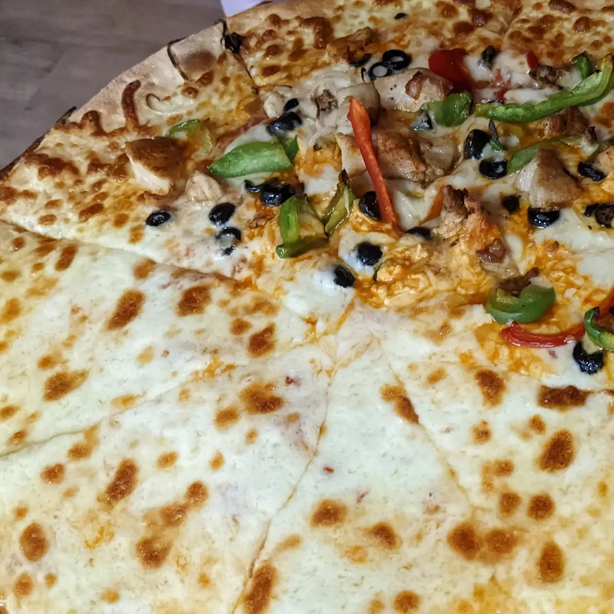 Pizza Cheese Half and Buffalo Chicken Pizza