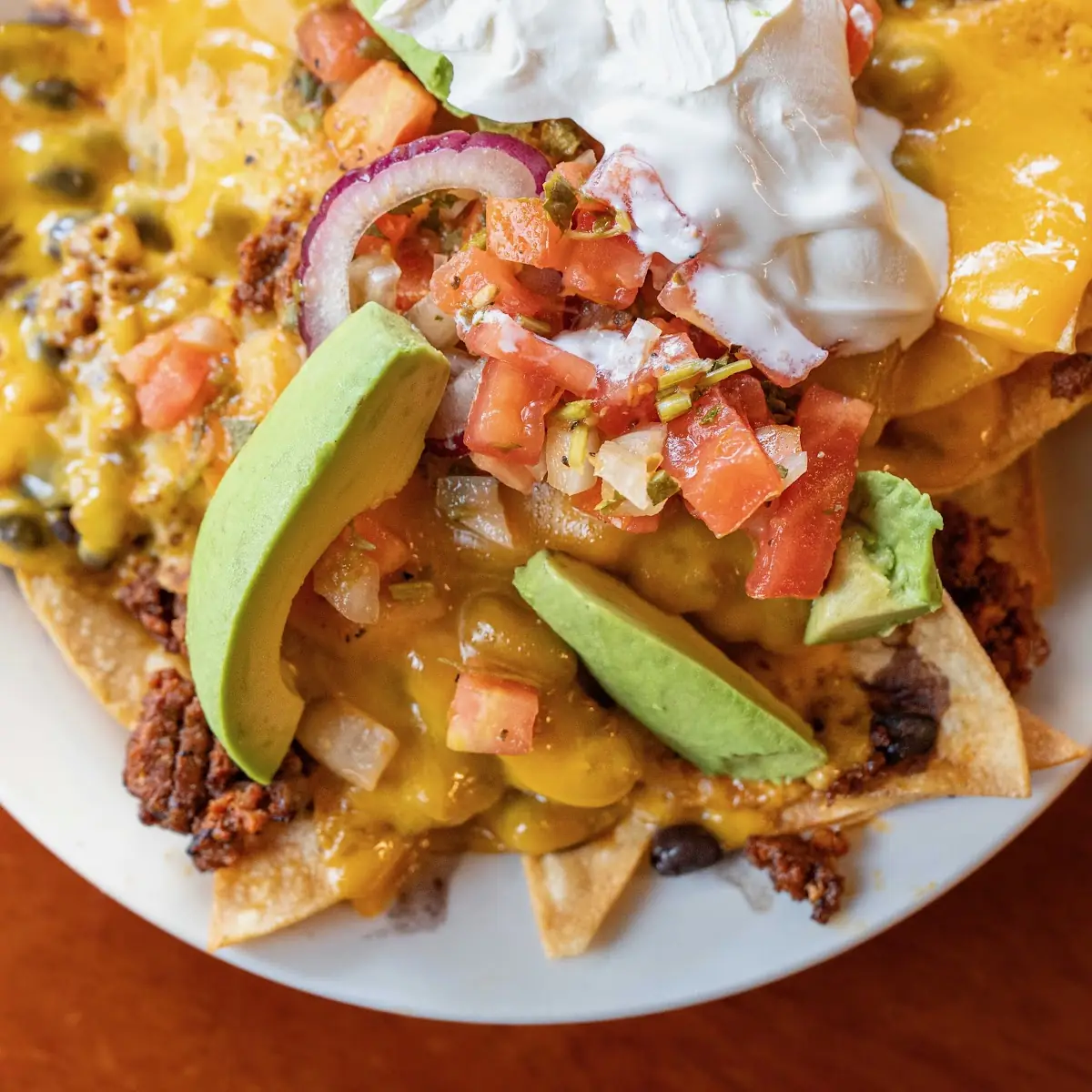 Cheese Nachos with Pepper Jack & Cheddar Cheese Black Beans Guac & Jalapeños