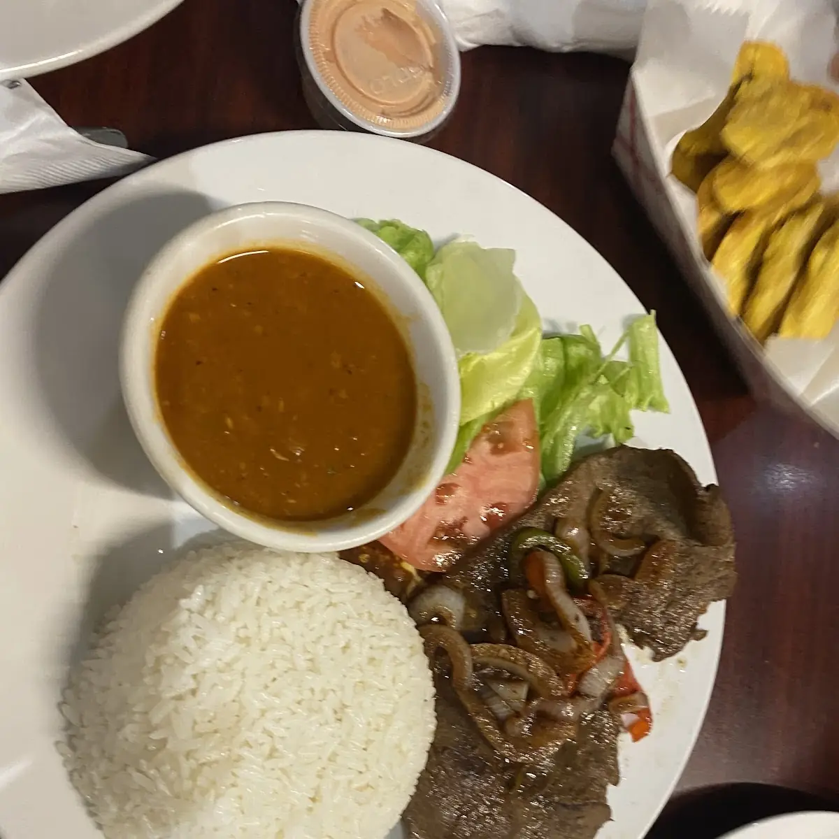 Rice Beans Steak and a Salad Serving