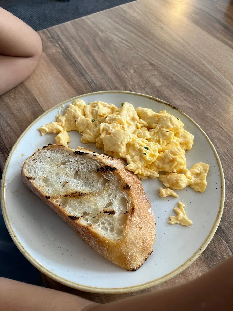 Scrambled Eggs on Sourdough Bread Maple Bacon & Chives, Drake and Duck Cafe