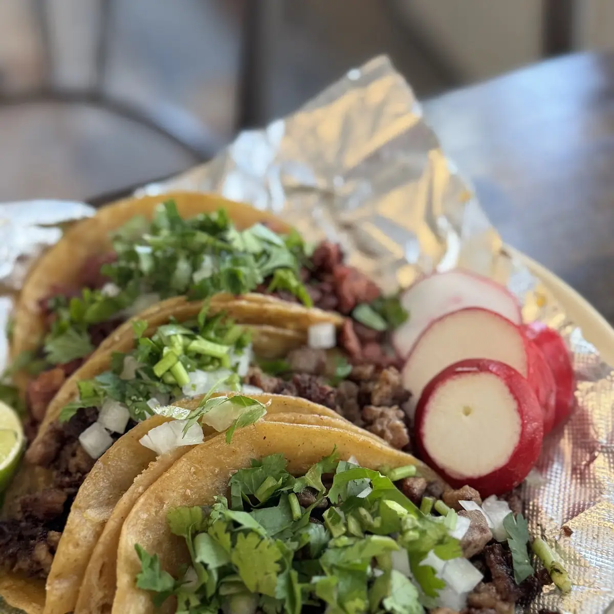 Assorted Tacos with Grilled Onions