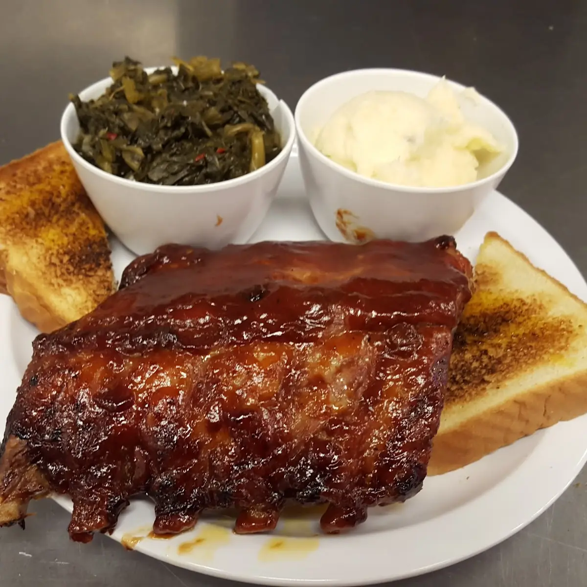 BBQ Ribs Turnip Greens and Mash Potatoes