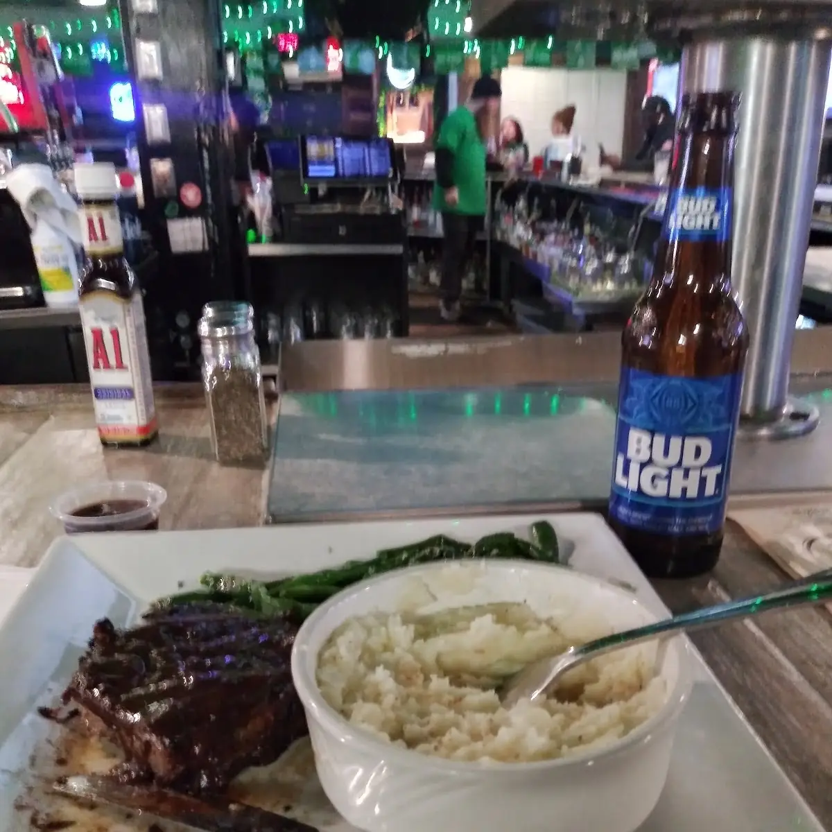 14oz Angus Ribeye and a Bud Light Cold Beer