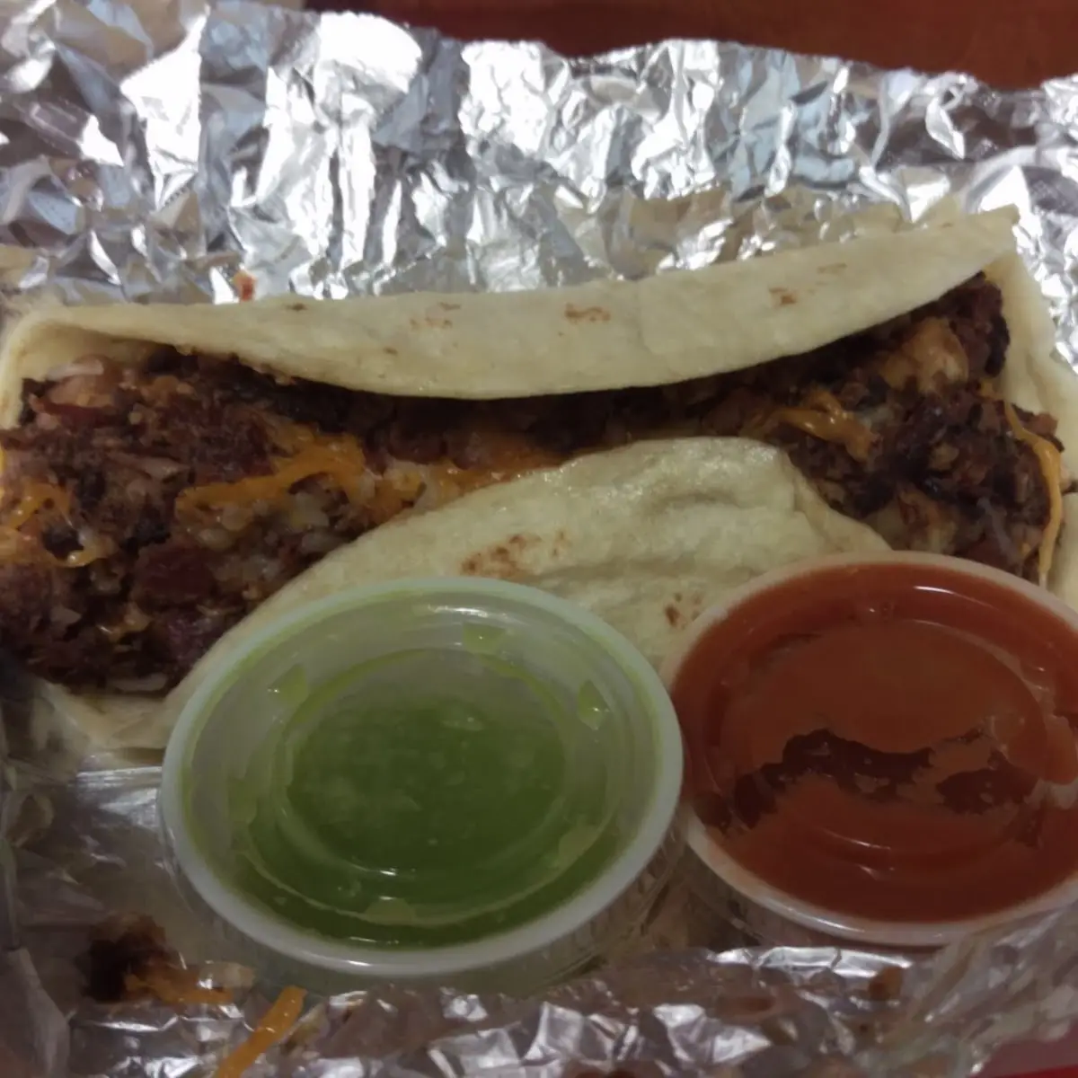 Brisket Potatoes Bacon Refried Beans and Cheese