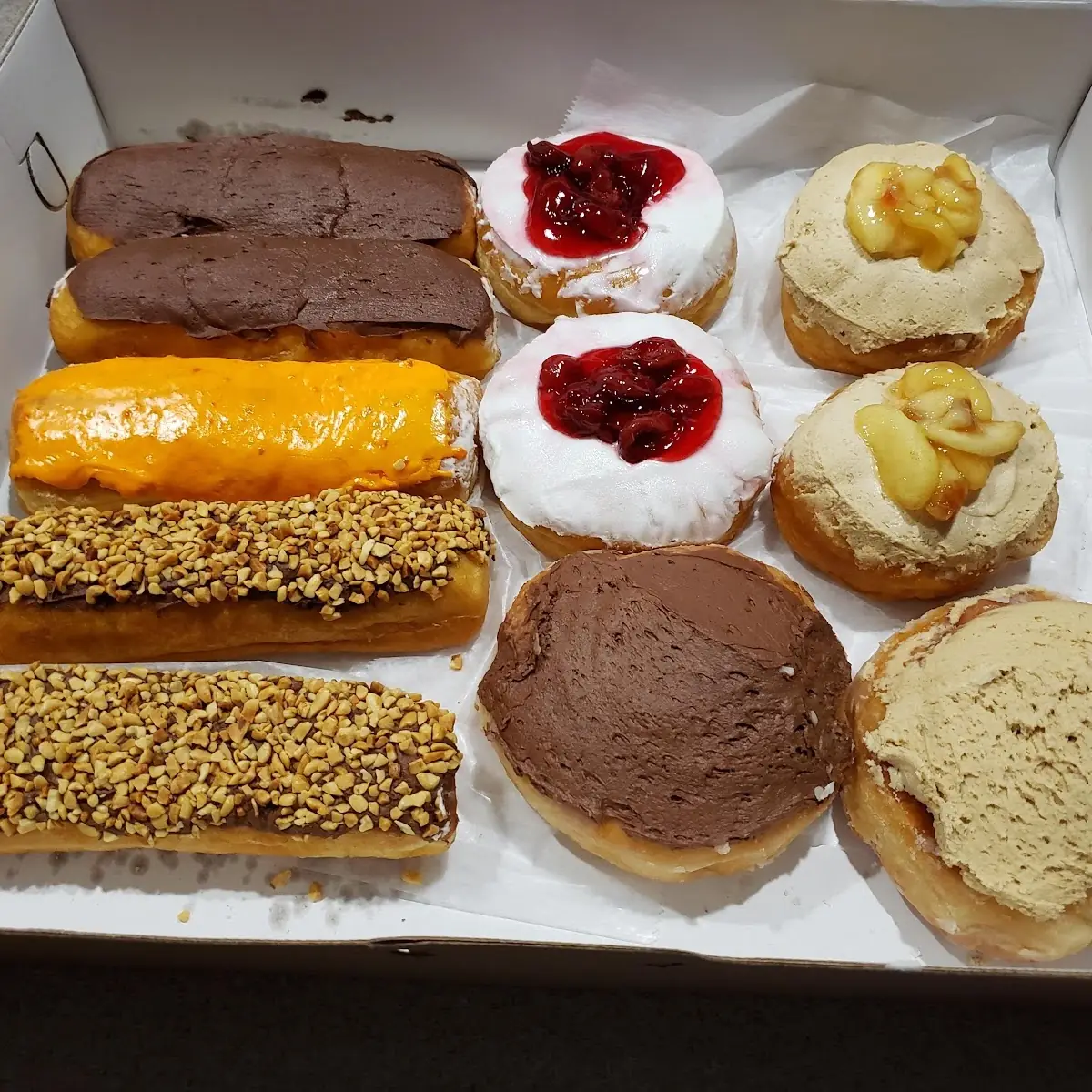 Frosted Cinnamon Roll Cream Filled Long Johns