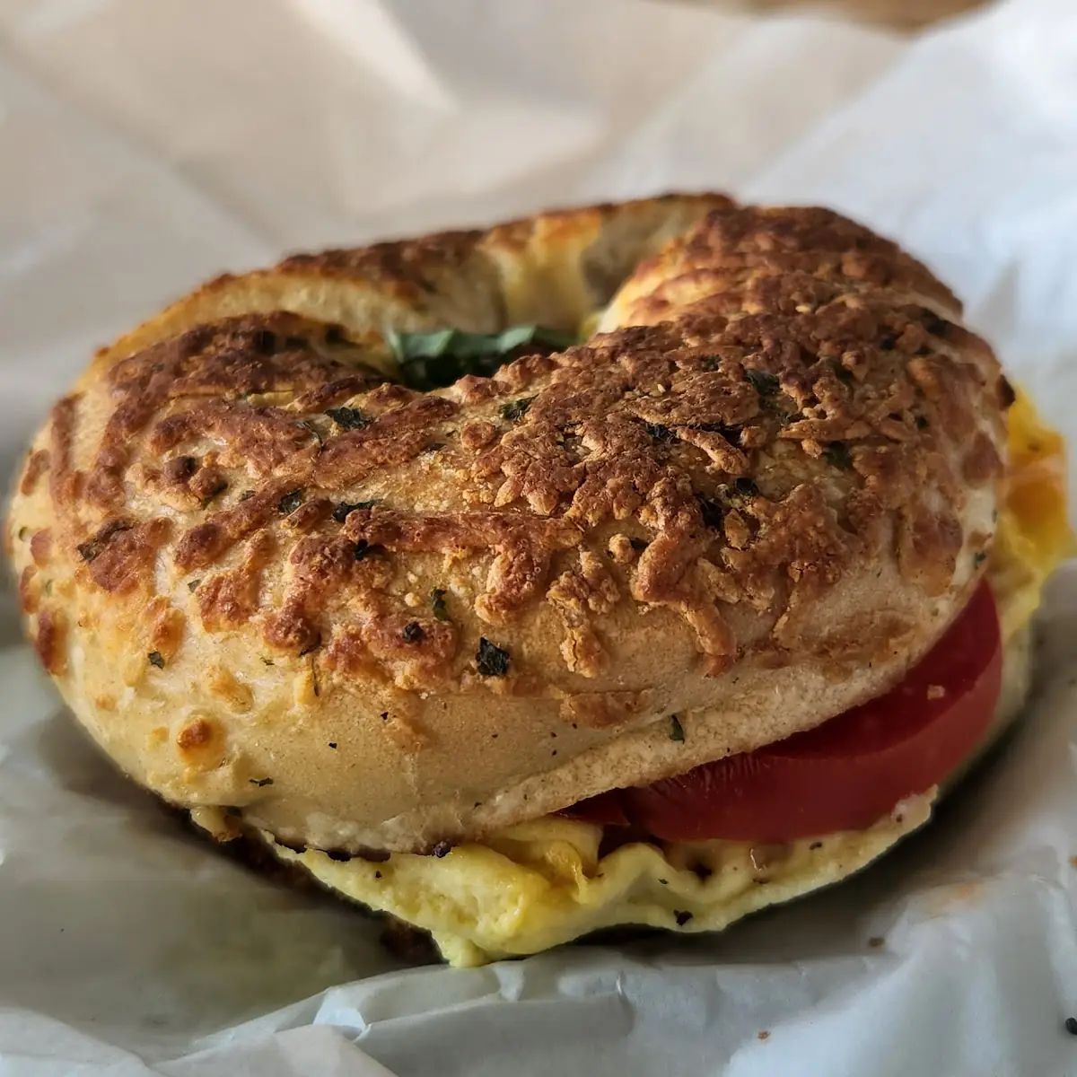 Tomato Basil Egg & Cheese on Asiago Bagel
