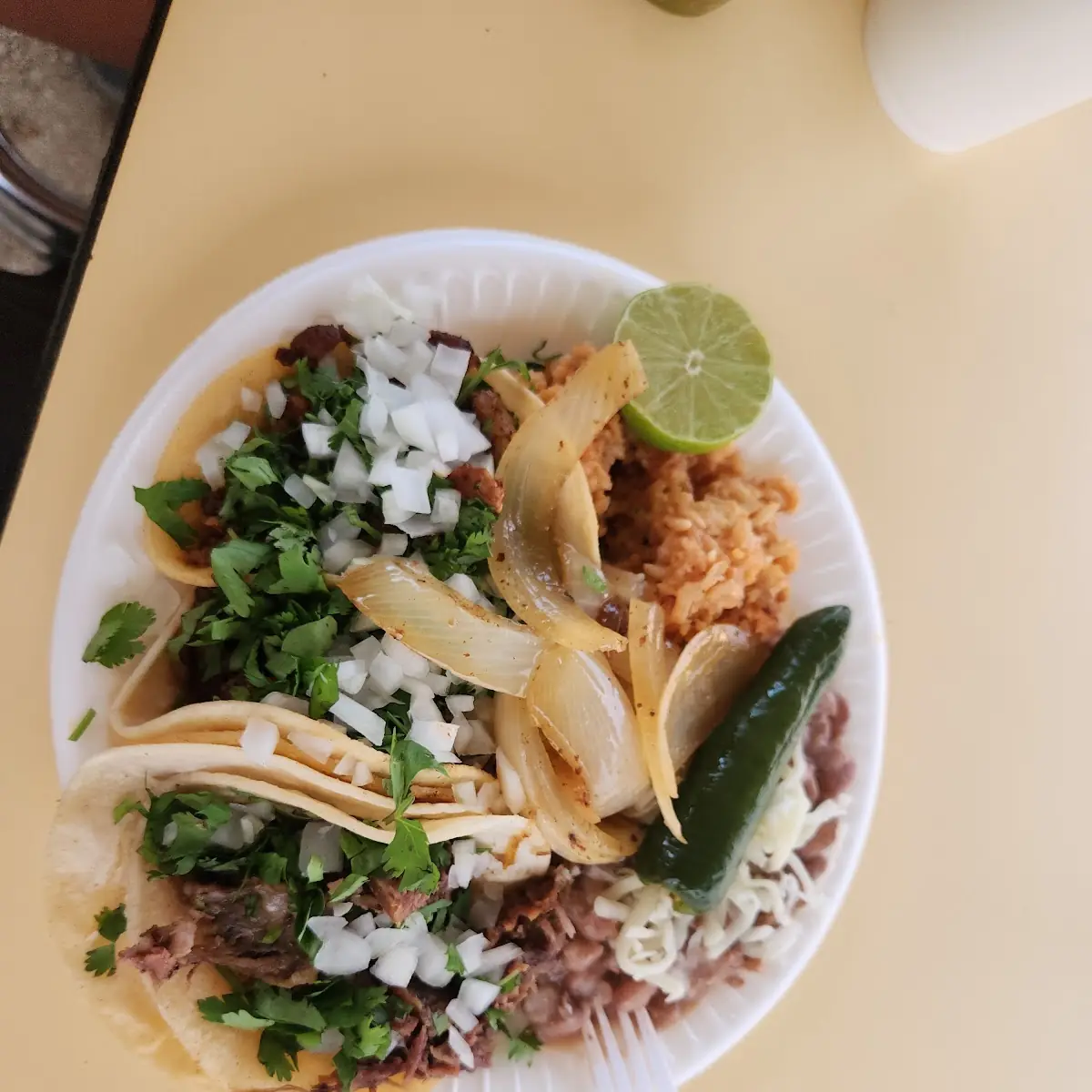 Carnitas Taco with Grilled Onions