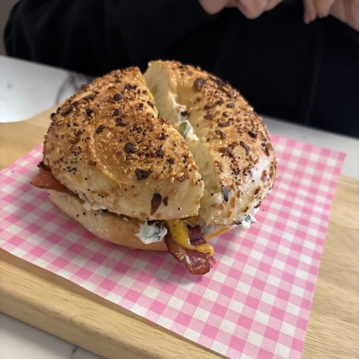 Bacon and Egg Sandwich on an Everything Bagel with Chive Cream Cheese