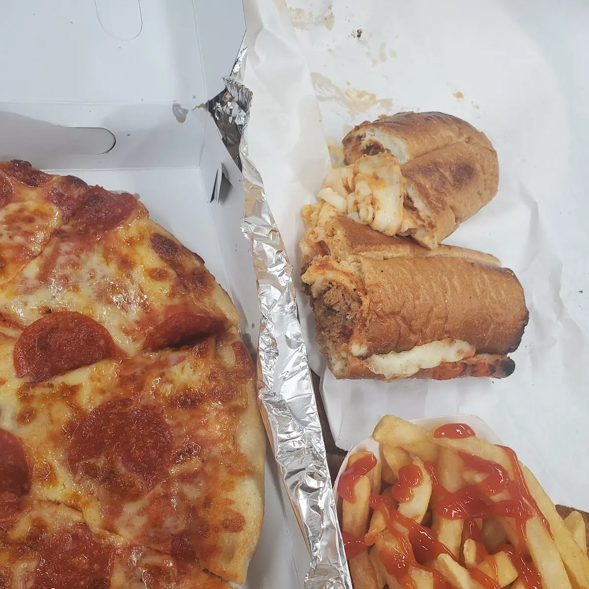 Small Pepperoni Pizza and a Small Meatball Sub