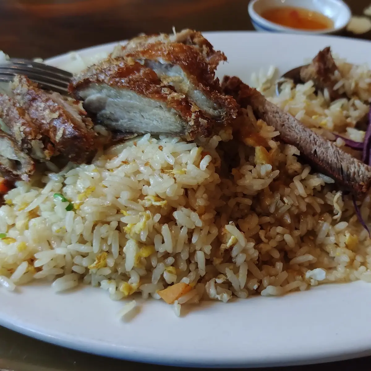 Crispy Duck over Fried Rice