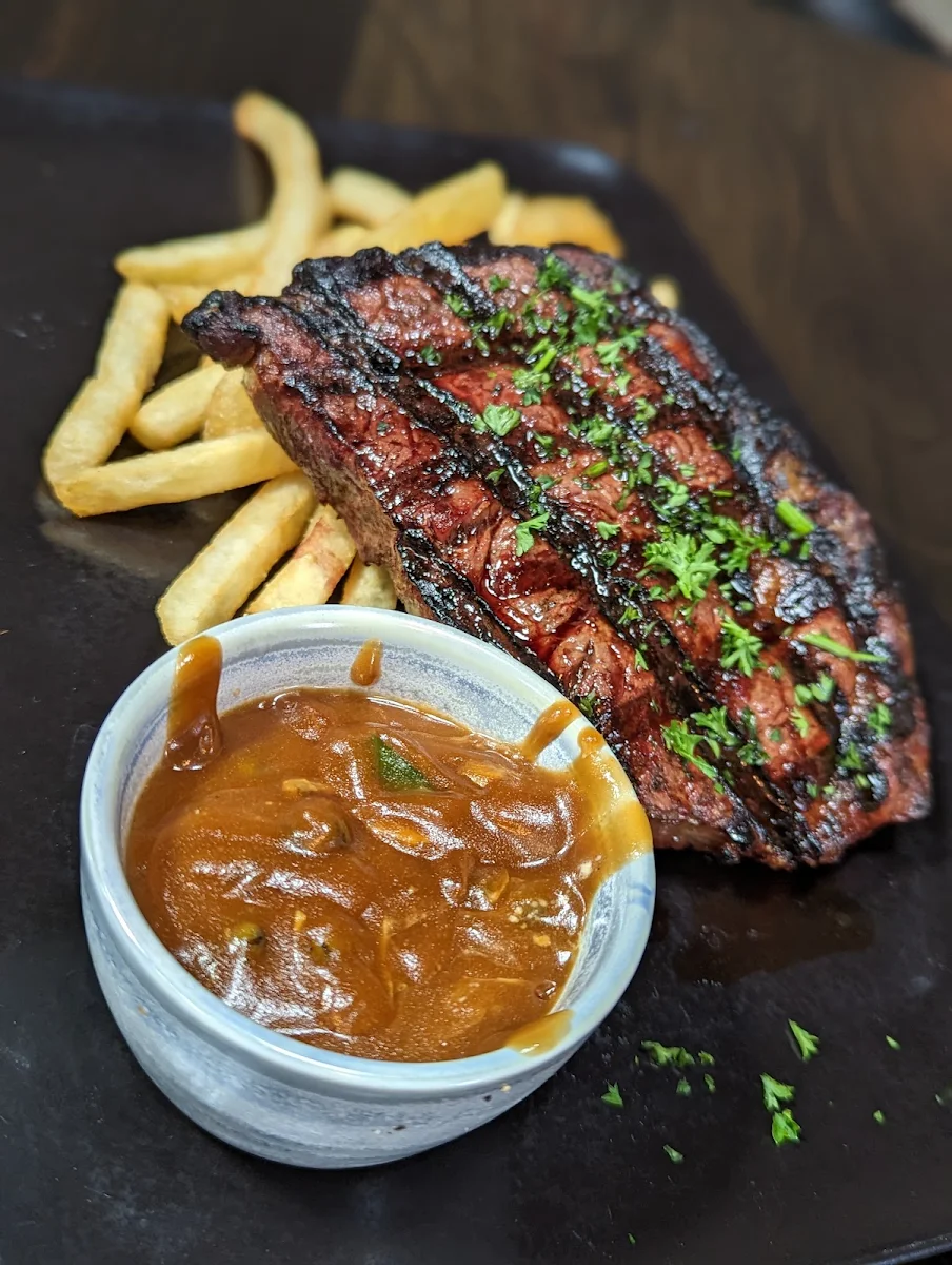 Scotch Fillet Steak with Peppercorn Sauce Chips and Garden Salad