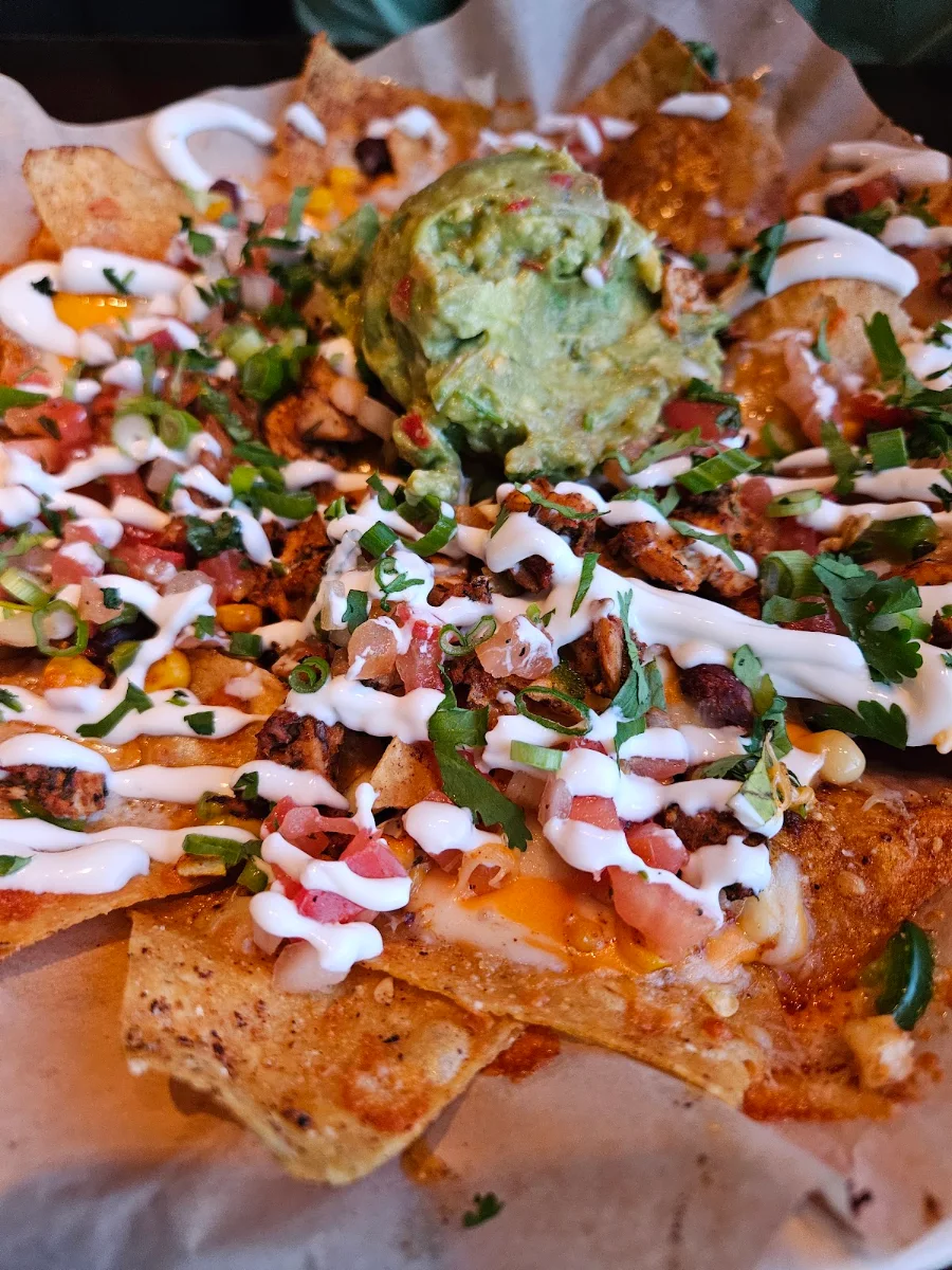 Loaded Nachos Corn Black Beans Jalapenos Queso Fresco Pico De Gallo Sour Cream Guacamole