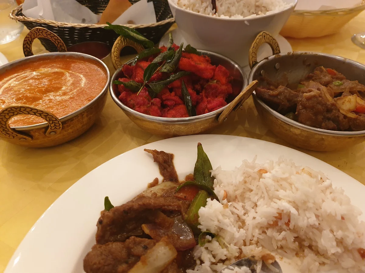 Goat Curry on Right, Deccan Paradise Restaurant and Grill
