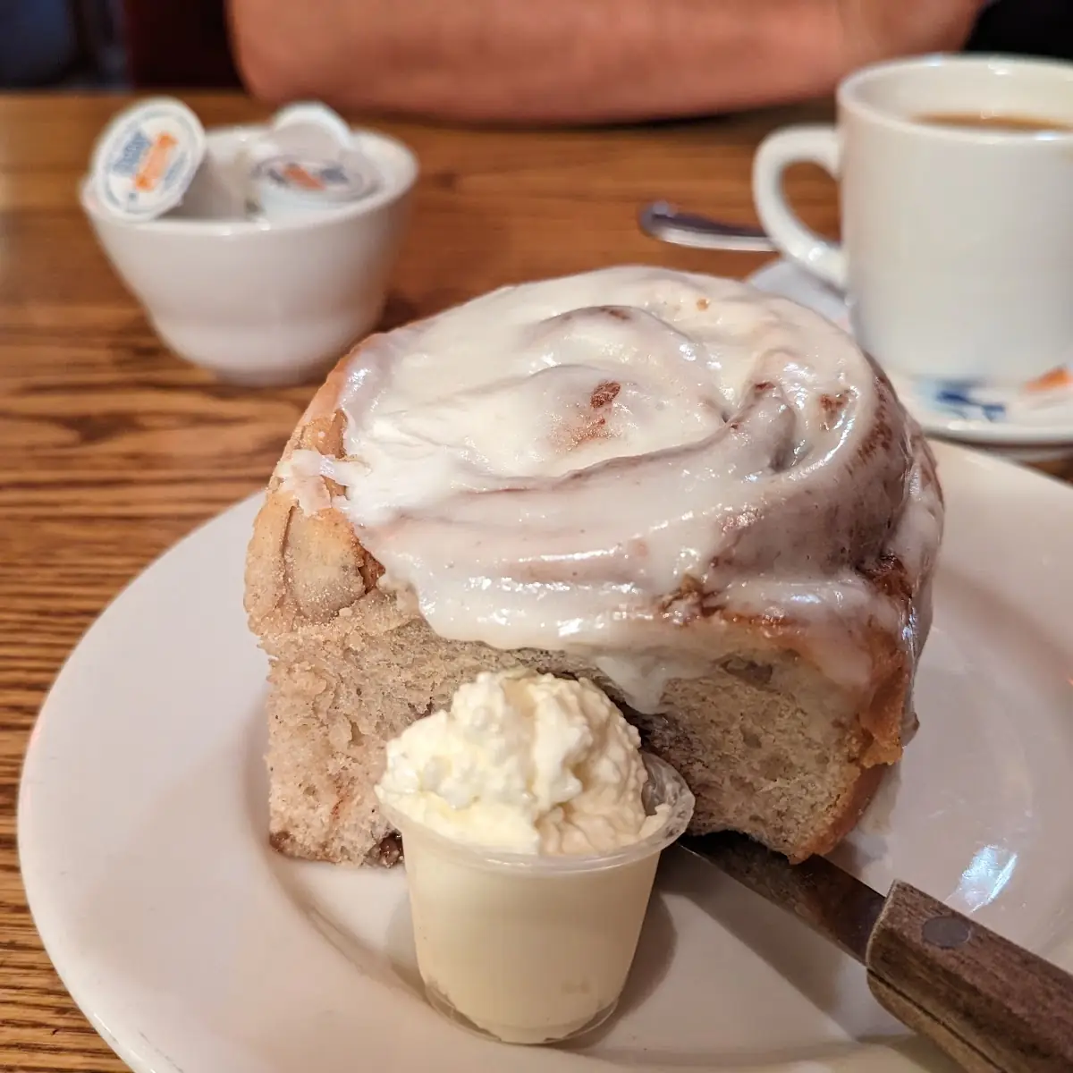 Frosted Cinnamon Roll with Butter