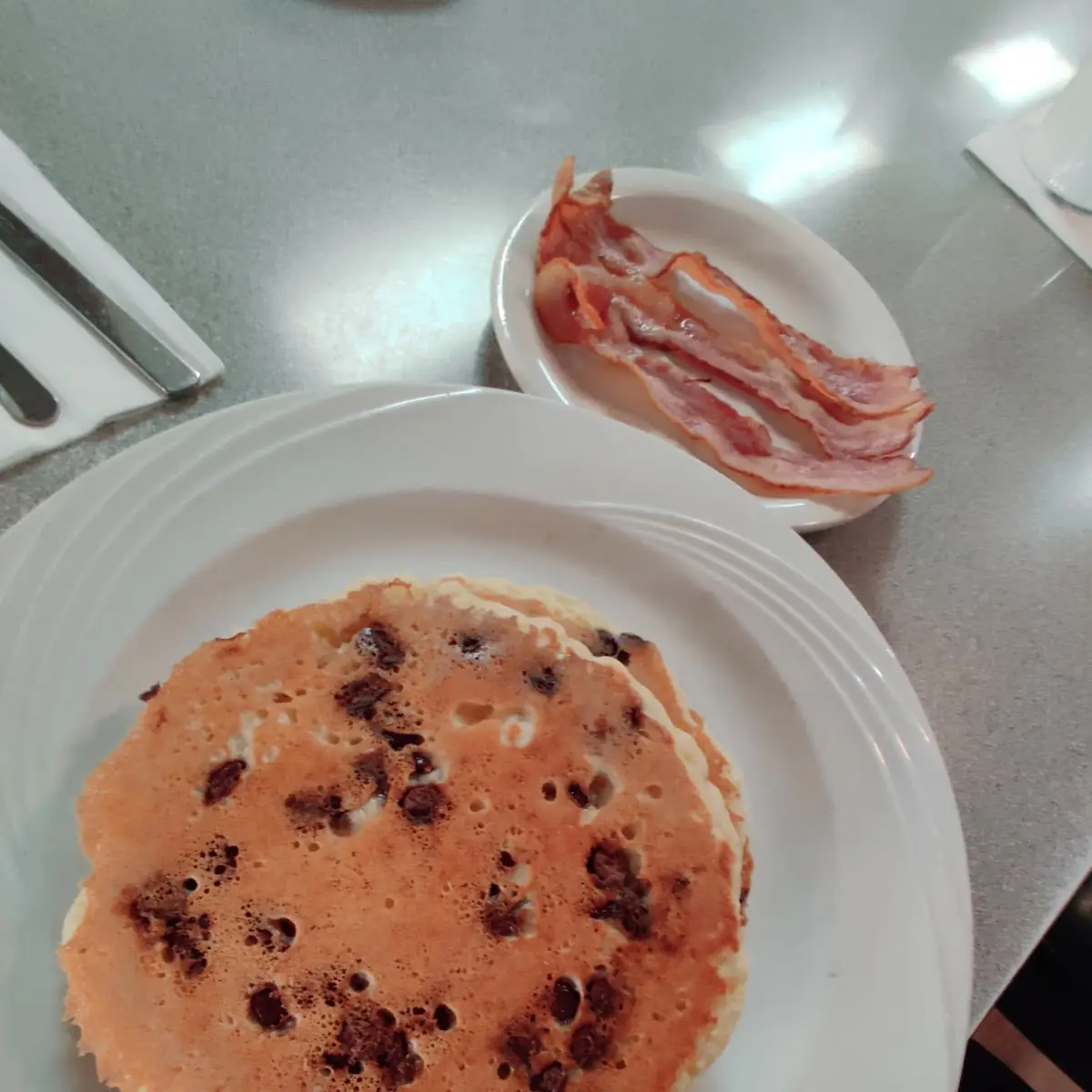 Chocolate Chip Pancakes with Bacon Strips