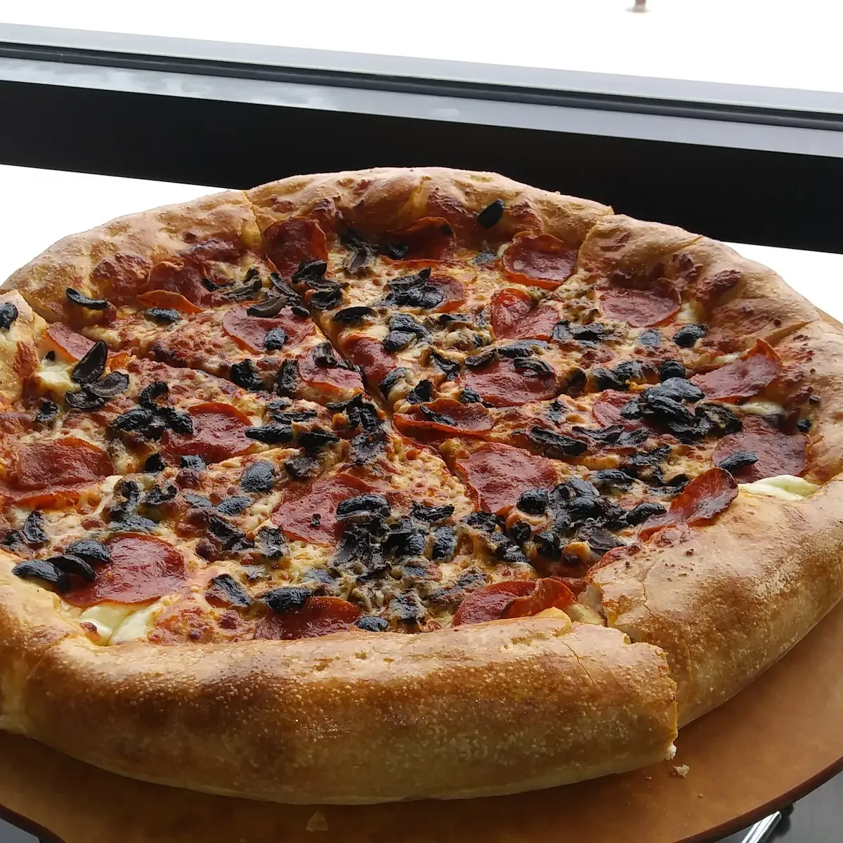 Stuffed Crust Pepperoni and Black Olive Pizza