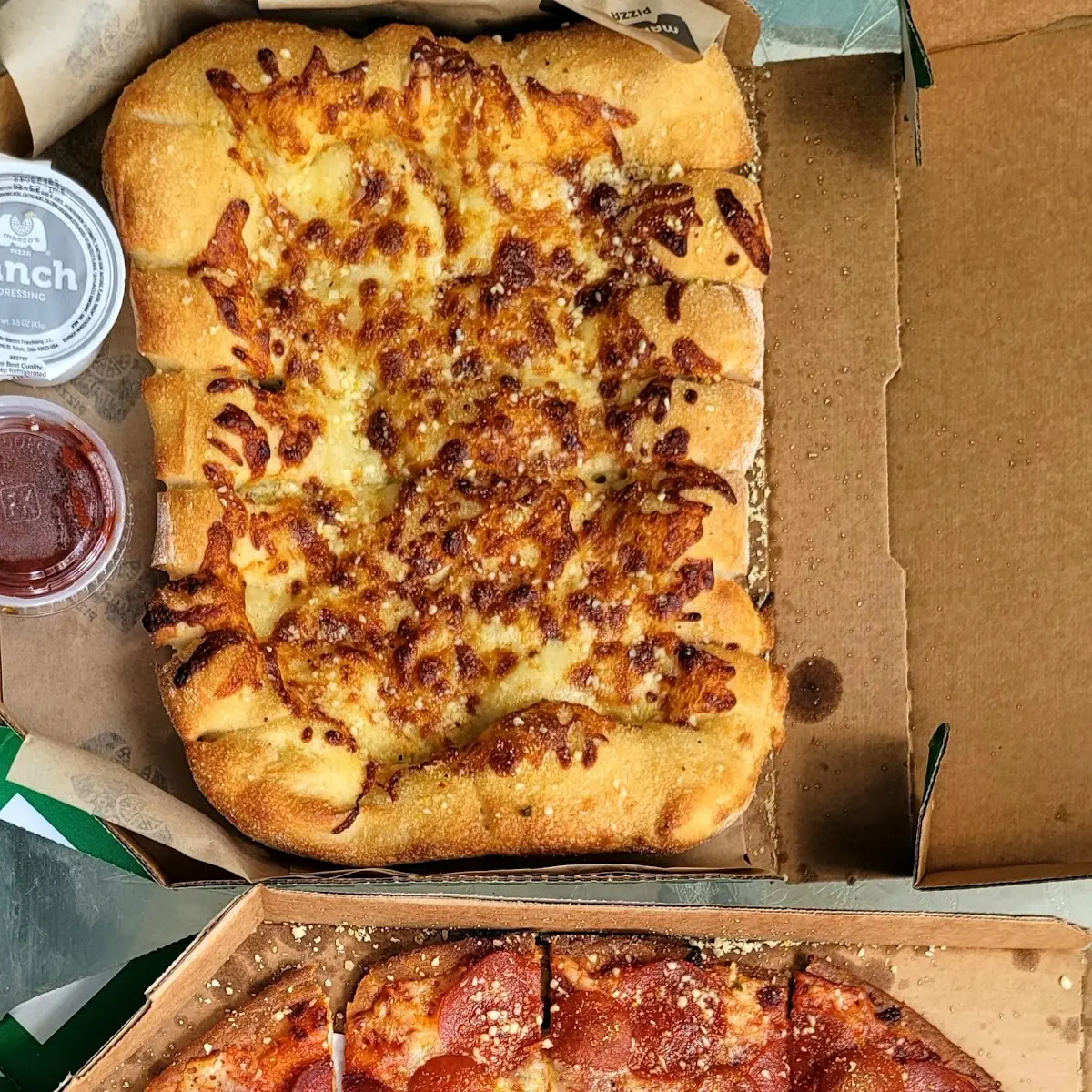 Thin Crust Pepperoni Pizza and Cheezy Bread Sticks