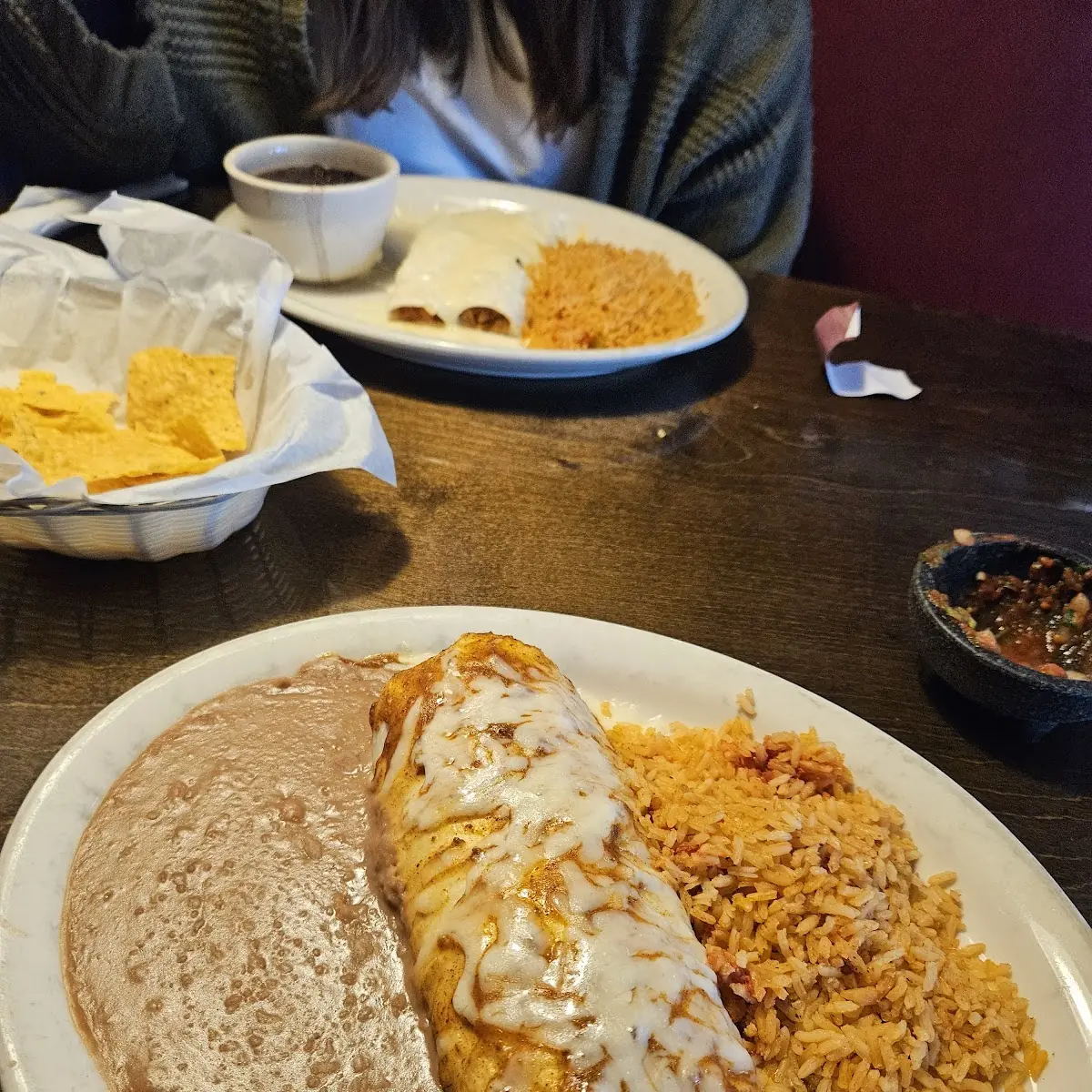 Beef Enchiladas Spanish Rice and Refried Beans