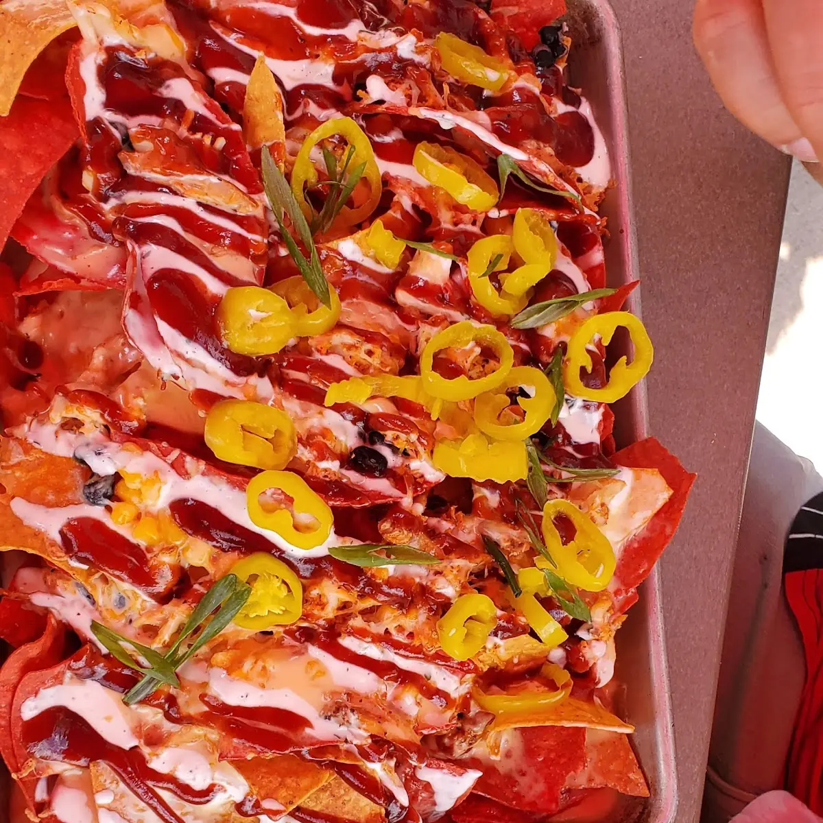 Nachos with Buffalo Chicken and Jalapeños