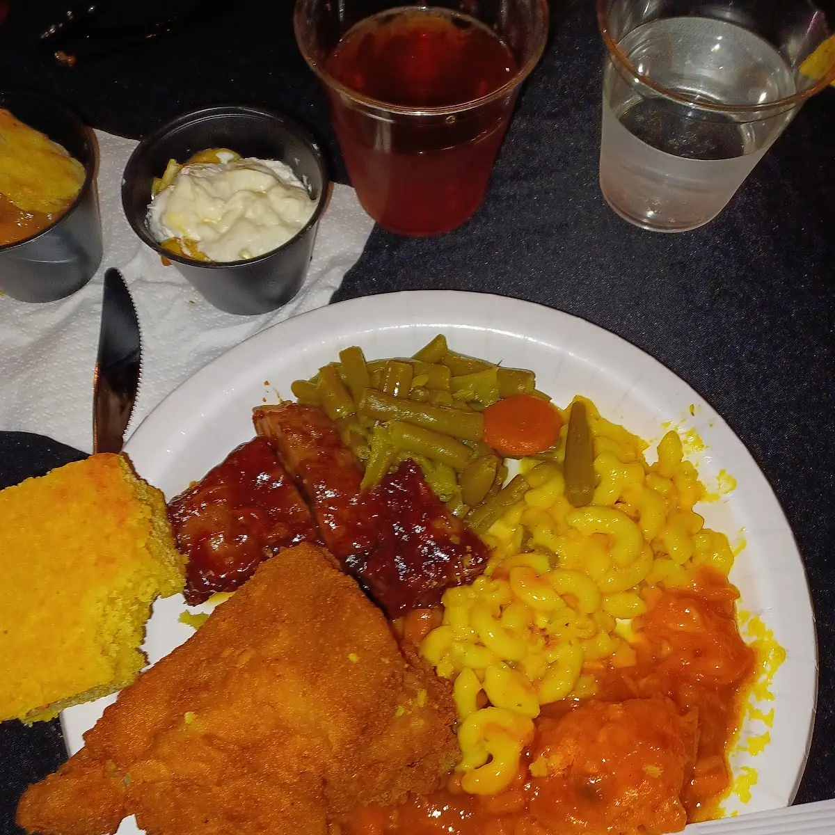 Fried Chicken Ribs Green Beans Mac and Cheese Cornbread and Sweet Potatoes