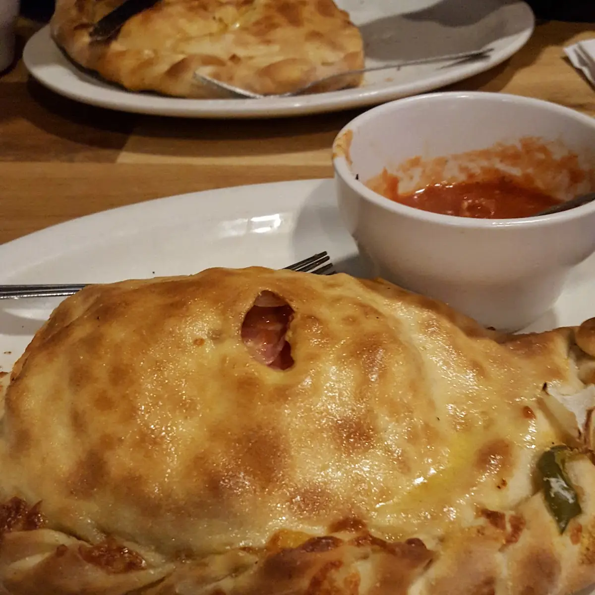 Baked Calzone and Dipping Sauce
