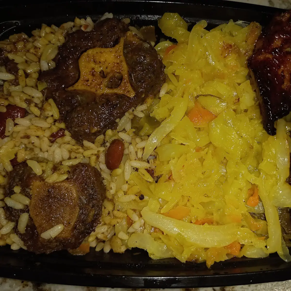 Oxtail Cabbage Plantains Peas & Rice