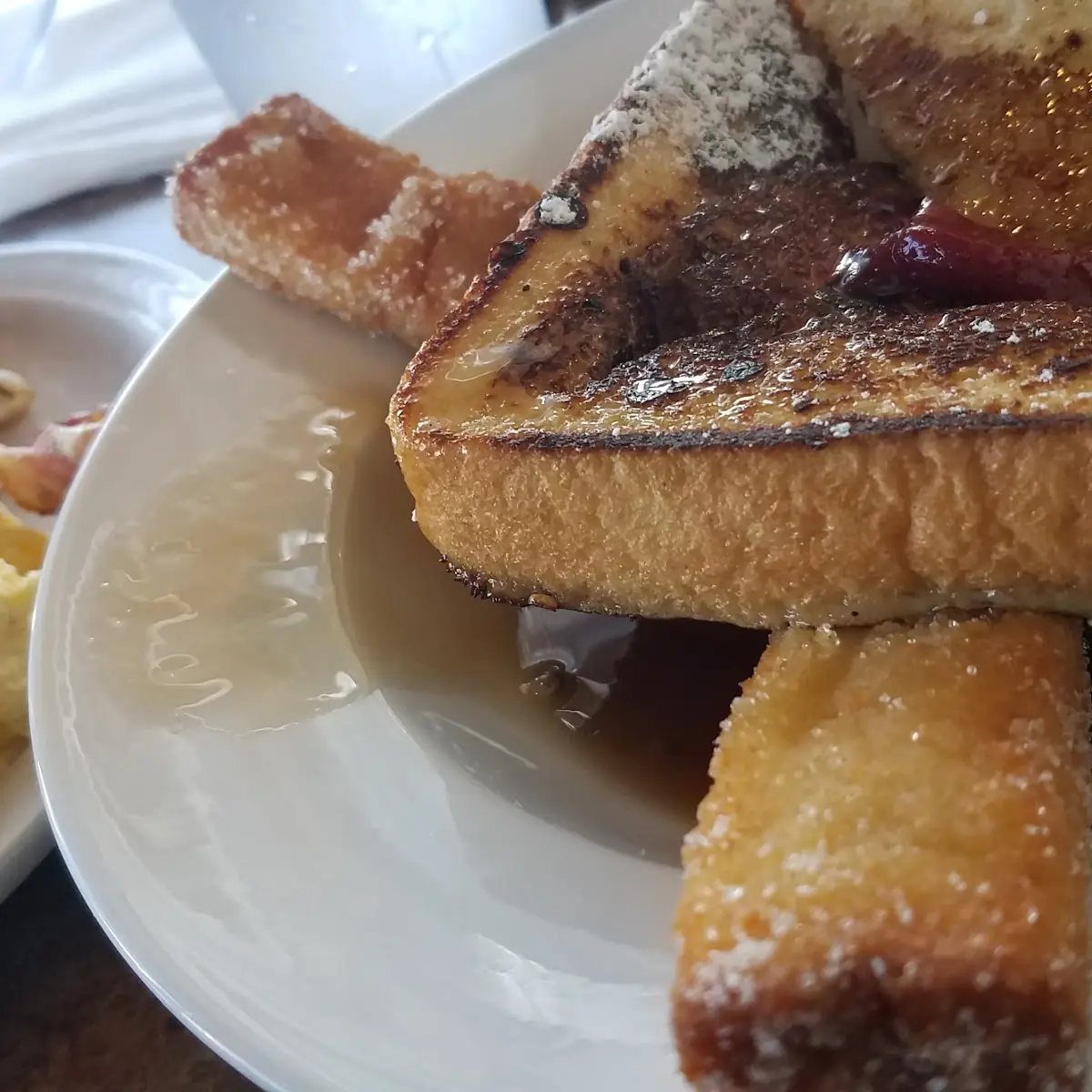 French Toast Castle Surrounded by Strawberry Syrup