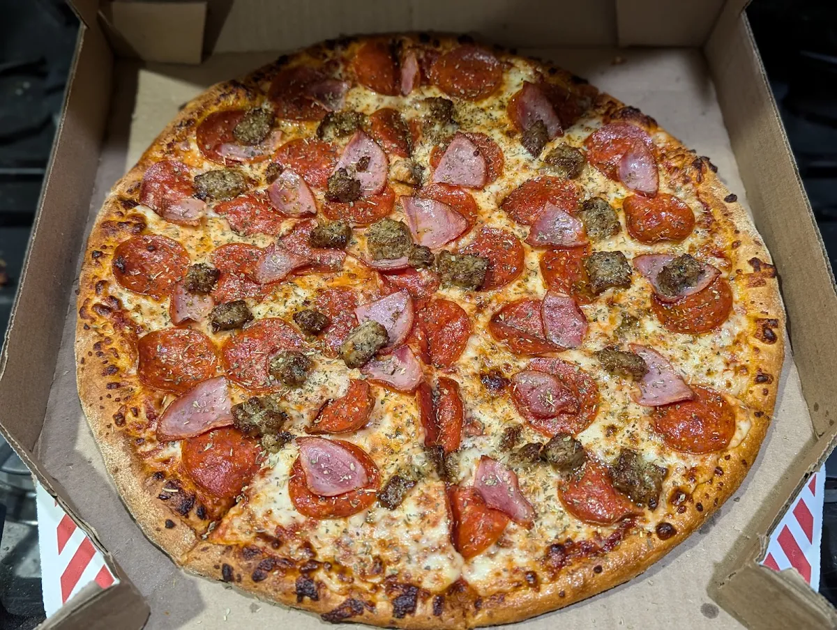 Ham Pepperoni and Italian Sausage Pizza