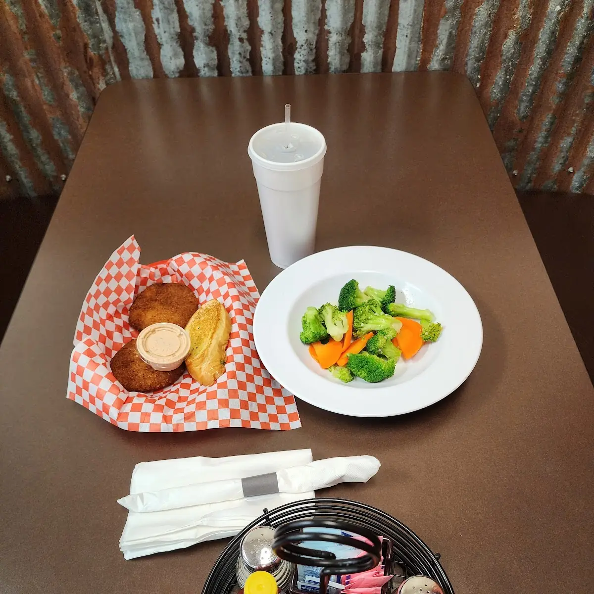 Crab Cakes Bread Medium Mixed Vegetables and a to-Go Drink