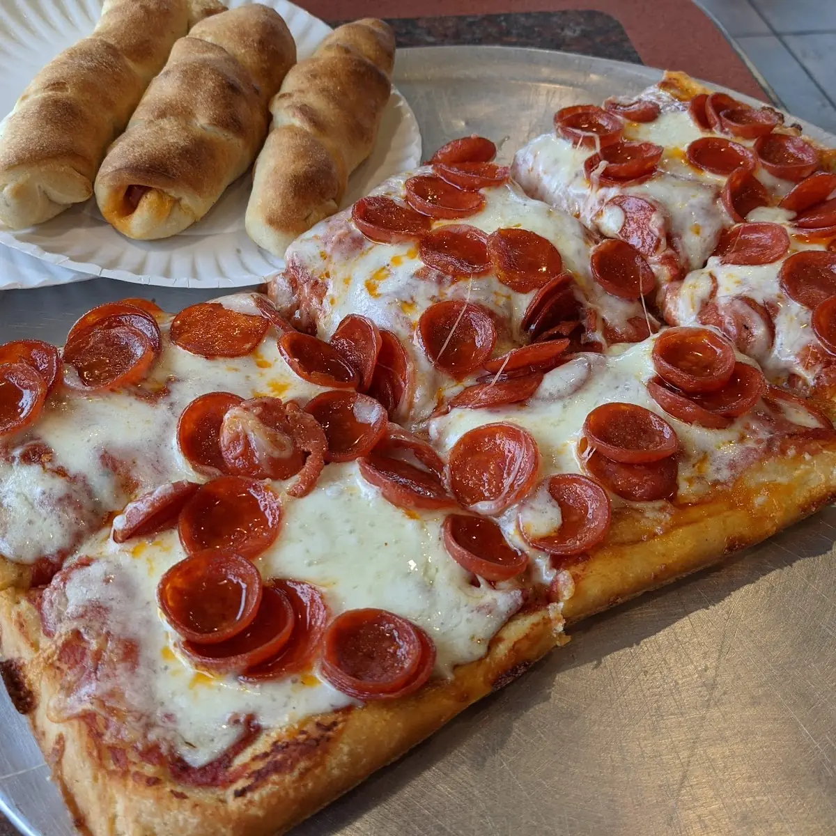 Pizza by the Slice Sicilian Pepperoni