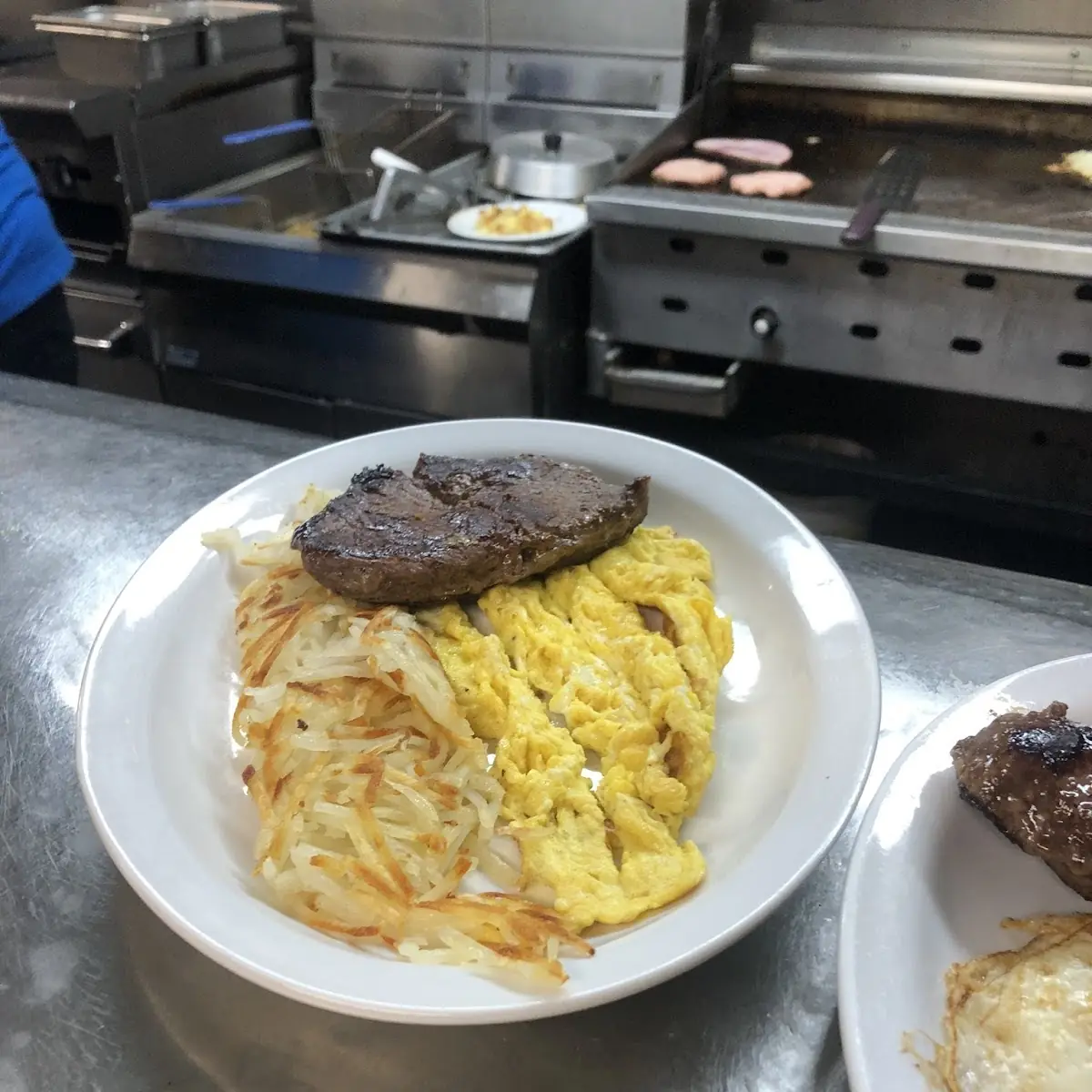 8 Oz Rib Eye Steak & Two Egg with Hash Browns & Toast