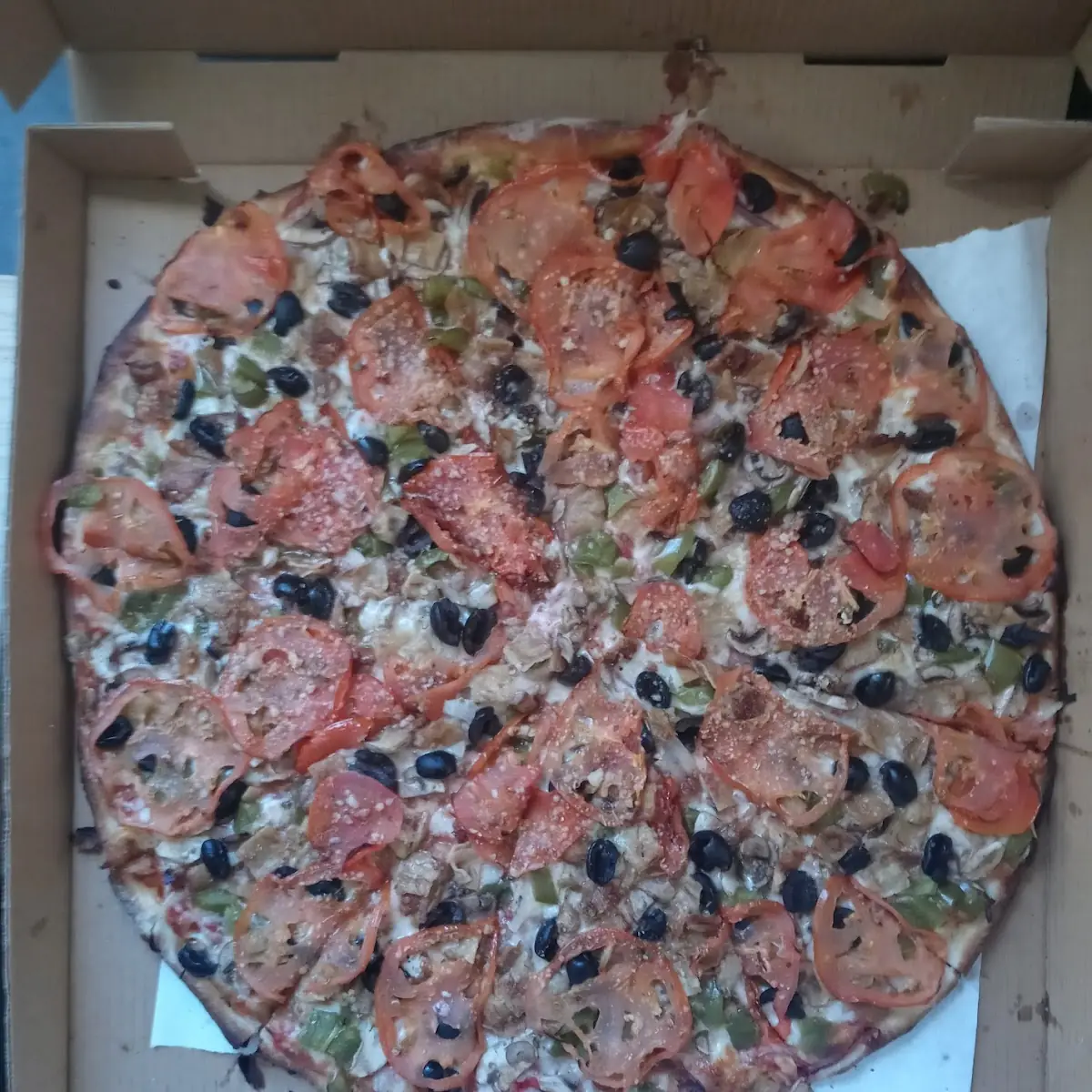 Veggie Special Pizza with Sliced Tomato