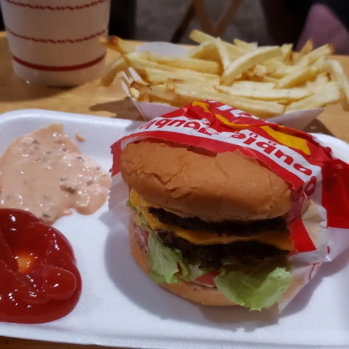 Double Cheeseburger and Fries with a Rootbeer Soda