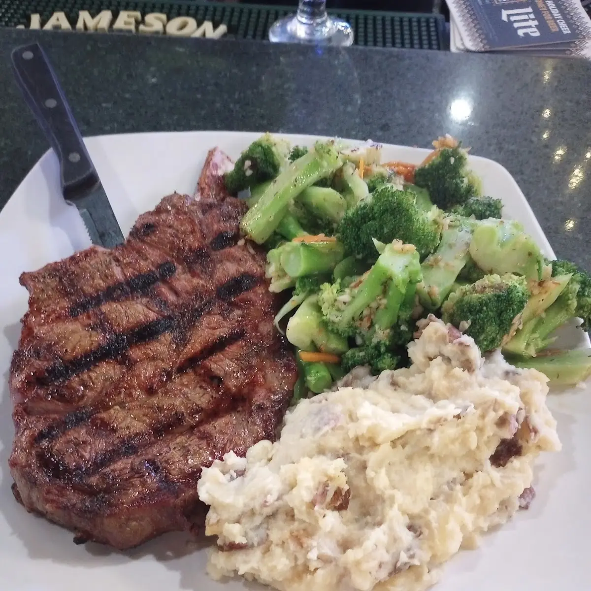 16 Oz Ribeye with Broccoli and Mashed Potatoes