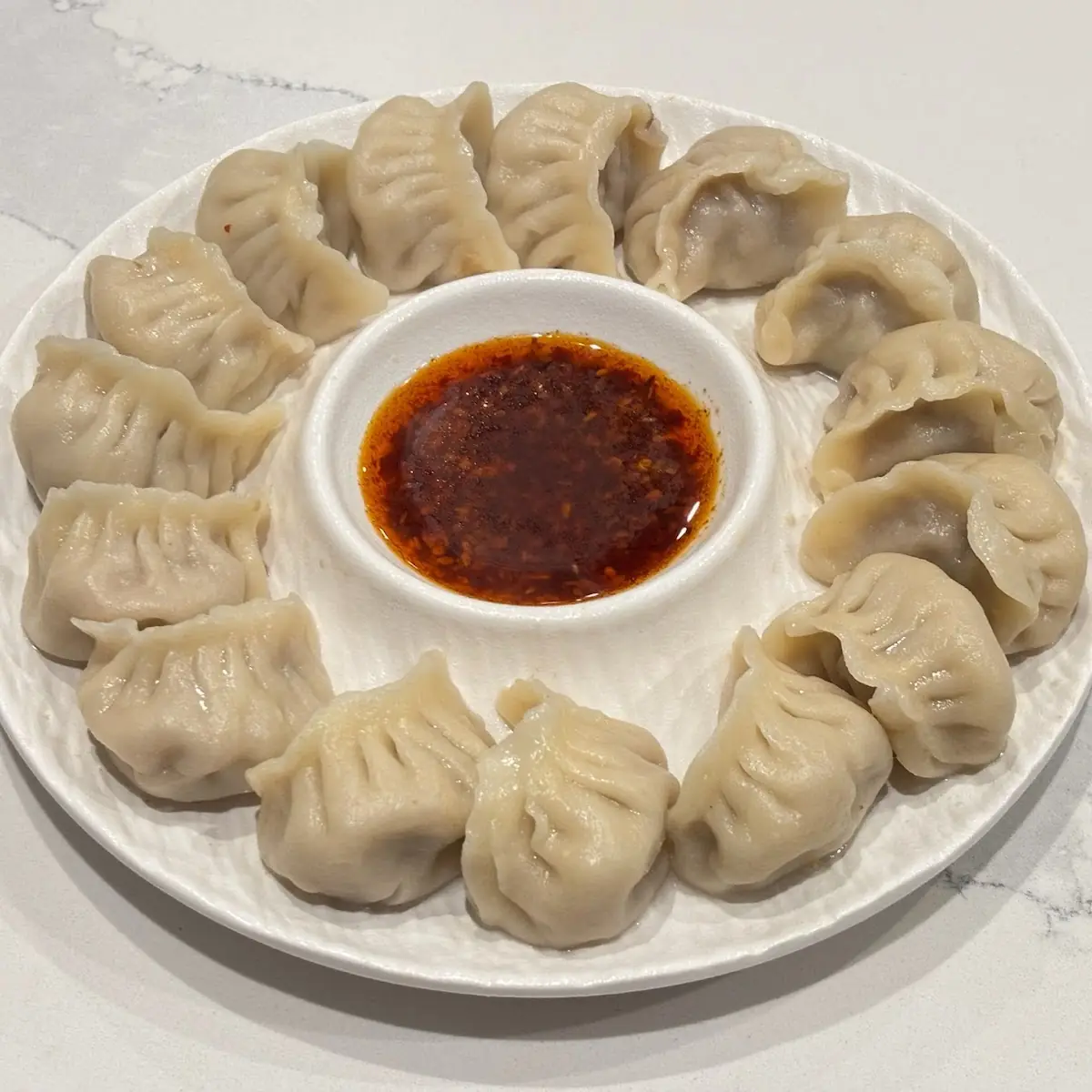 Steamed Dumplings with Chili Oil