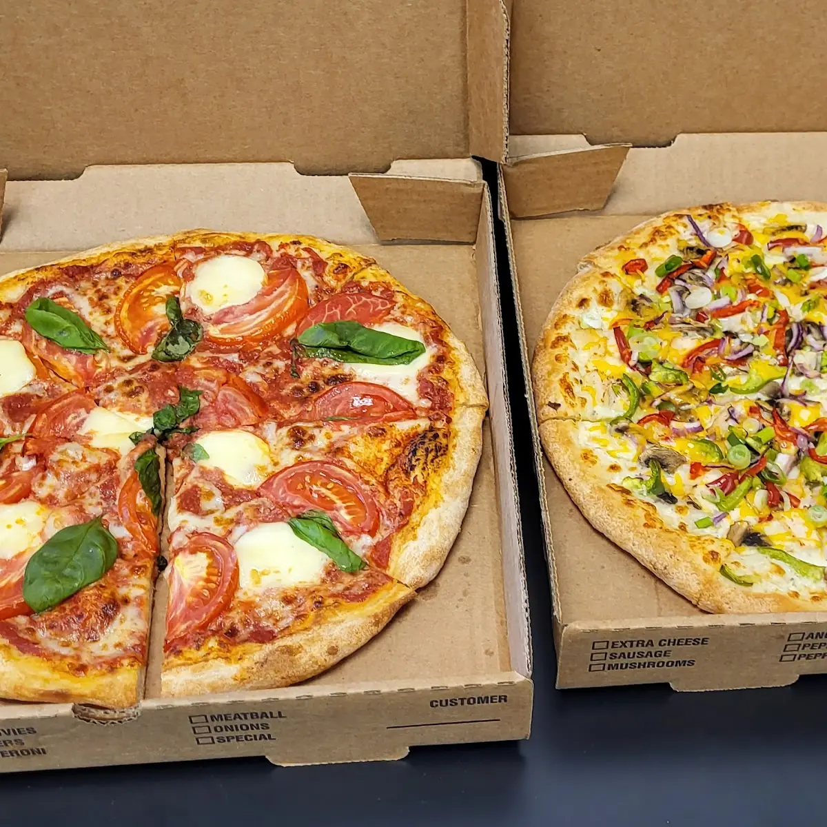 2 Medium Pizzas with 2 Toppings Salad or Garlic Bread & 2 Liter Bottle